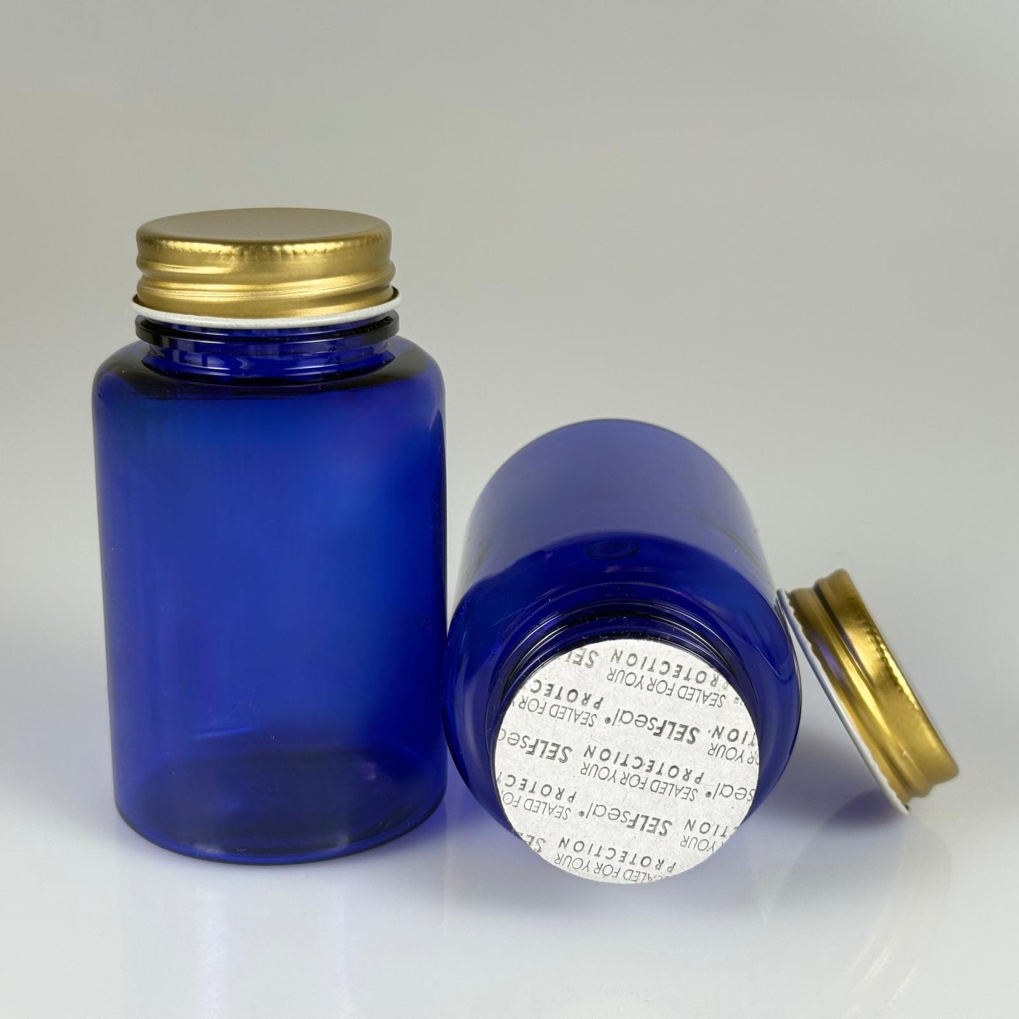 150 CC MAVİ PET TABLET ŞİŞESİ - GOLD METAL KAPAKLI + KÖPÜK CONTALI - 150 ML KAPSÜL KUTUSU - İLAÇ ŞİŞESİ - MEDİKAL HAP ŞİŞESİ - FARMASÖTİK KAVANOZ