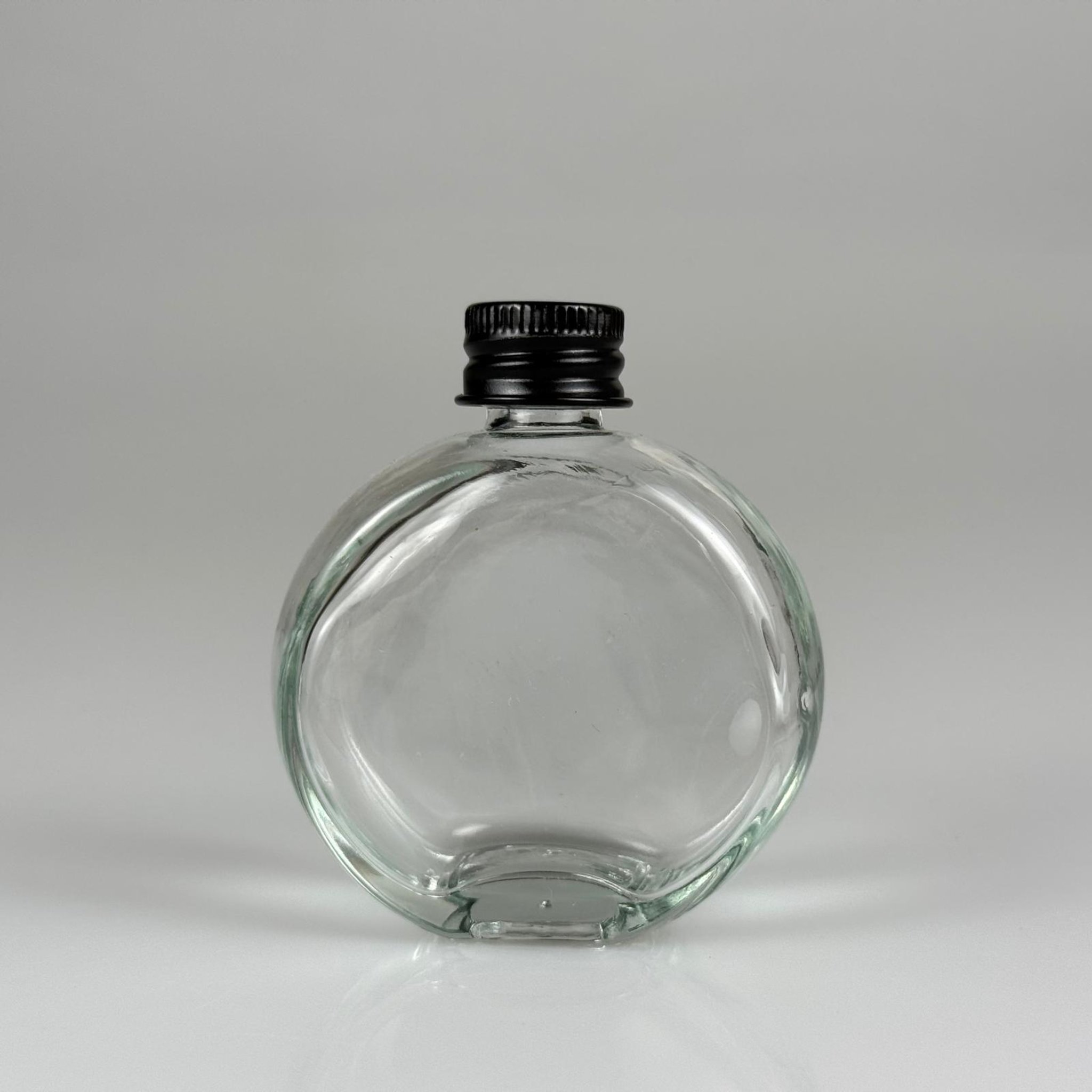 50 CC OVAL YASSI YUVARLAK CAM ŞİŞE + SİYAH ALÜMİNYUM METAL KAPAKLI TAKIM - 50 ML ŞEFFAF CAM ŞİŞE