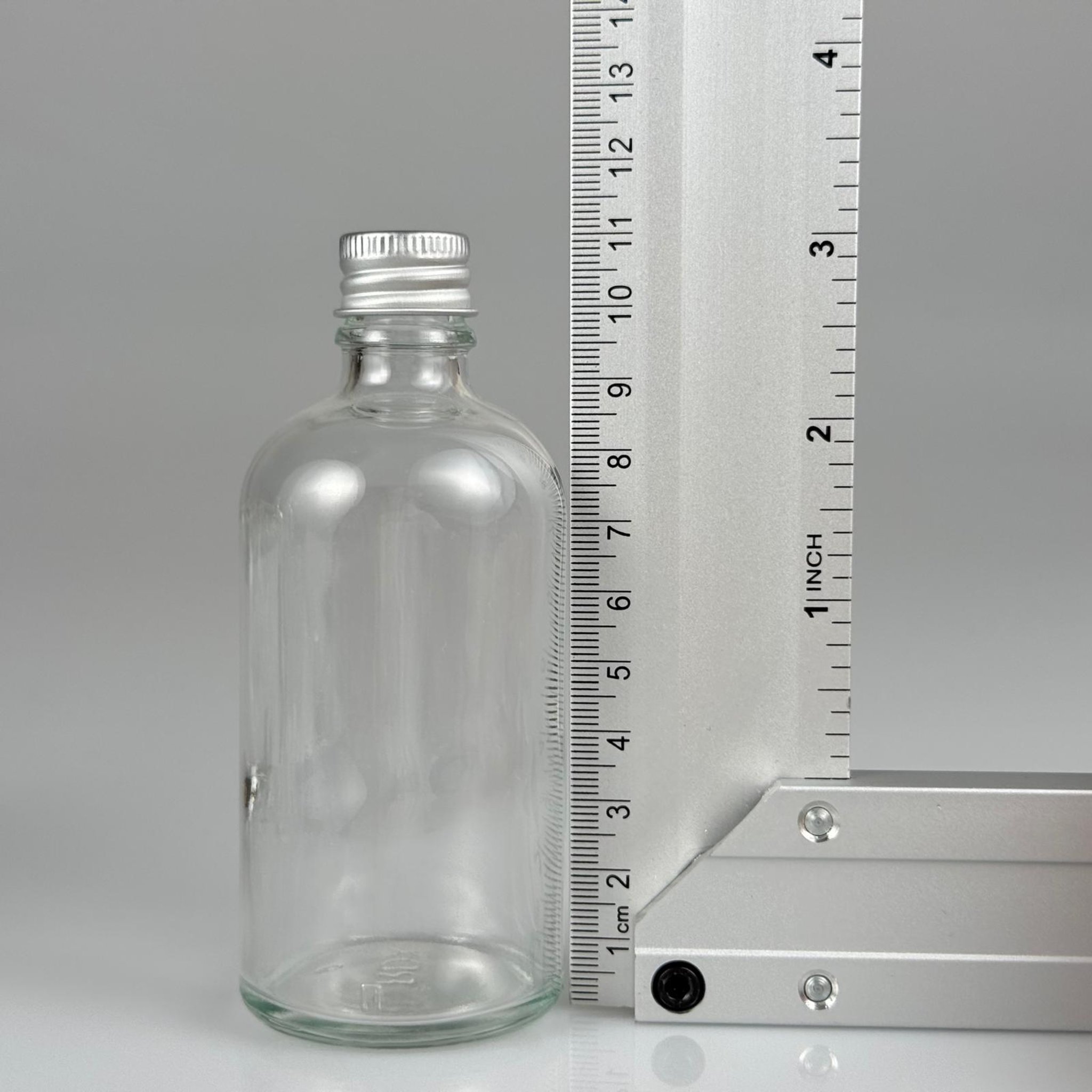 100 CC ŞEFFAF CAM ŞİŞE + KÖPÜK CONTALI GÜMÜŞ ALÜMİNYUM METAL KAPAKLI + KÖR TIPALI TAKIM - 100 ML ŞEFFAF CAM ŞİŞE