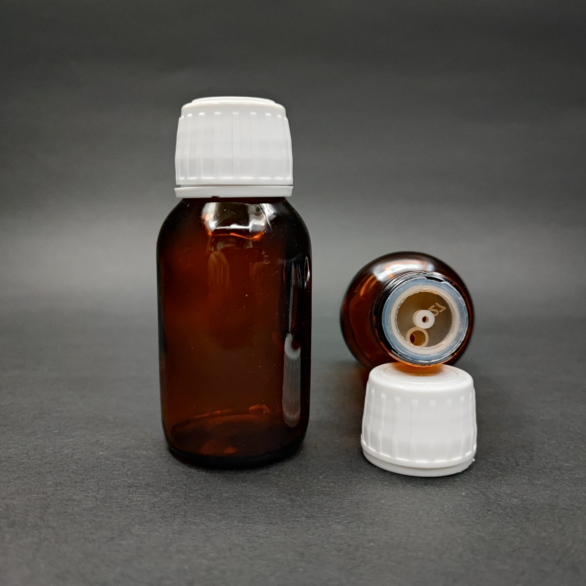 50 ML DOLUMU KOLAY, GENİŞ AĞIZLI İÇTEN DAMLALIKLI ŞİŞE (25 MM AĞIZ)  - 50 CC BEYAZ KİLİTLİ DAMLALIKLI CAM ECZA ŞİŞESİ - AMBER KAHVERENGİ