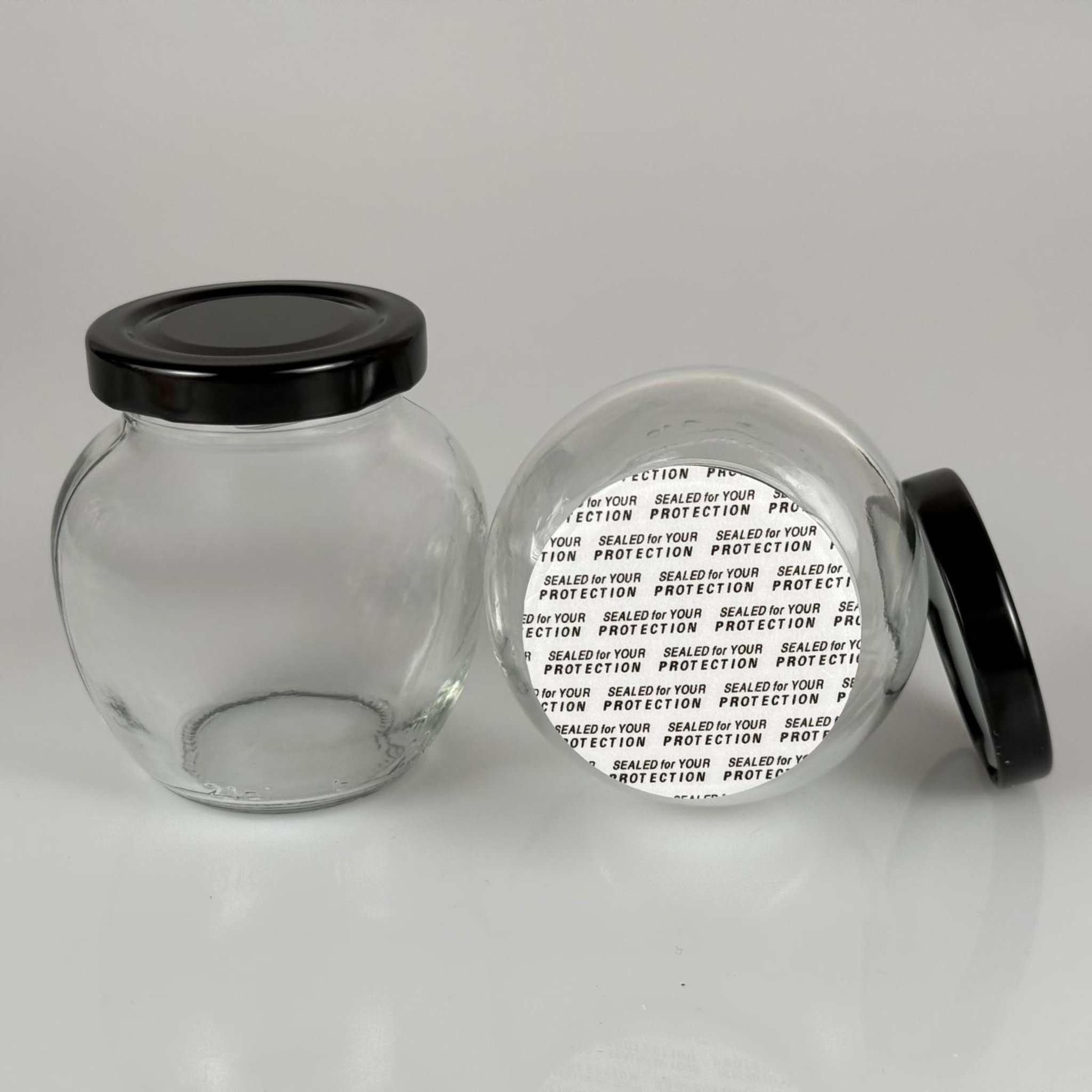 210 CC YUMURTA KAVANOZ + SİYAH METAL KAPAKLI + KENDİNDEN YAPIŞKANLI KÖPÜK CONTALI TAKIM - 210 ML OVAL TİP CAM KAVANOZ