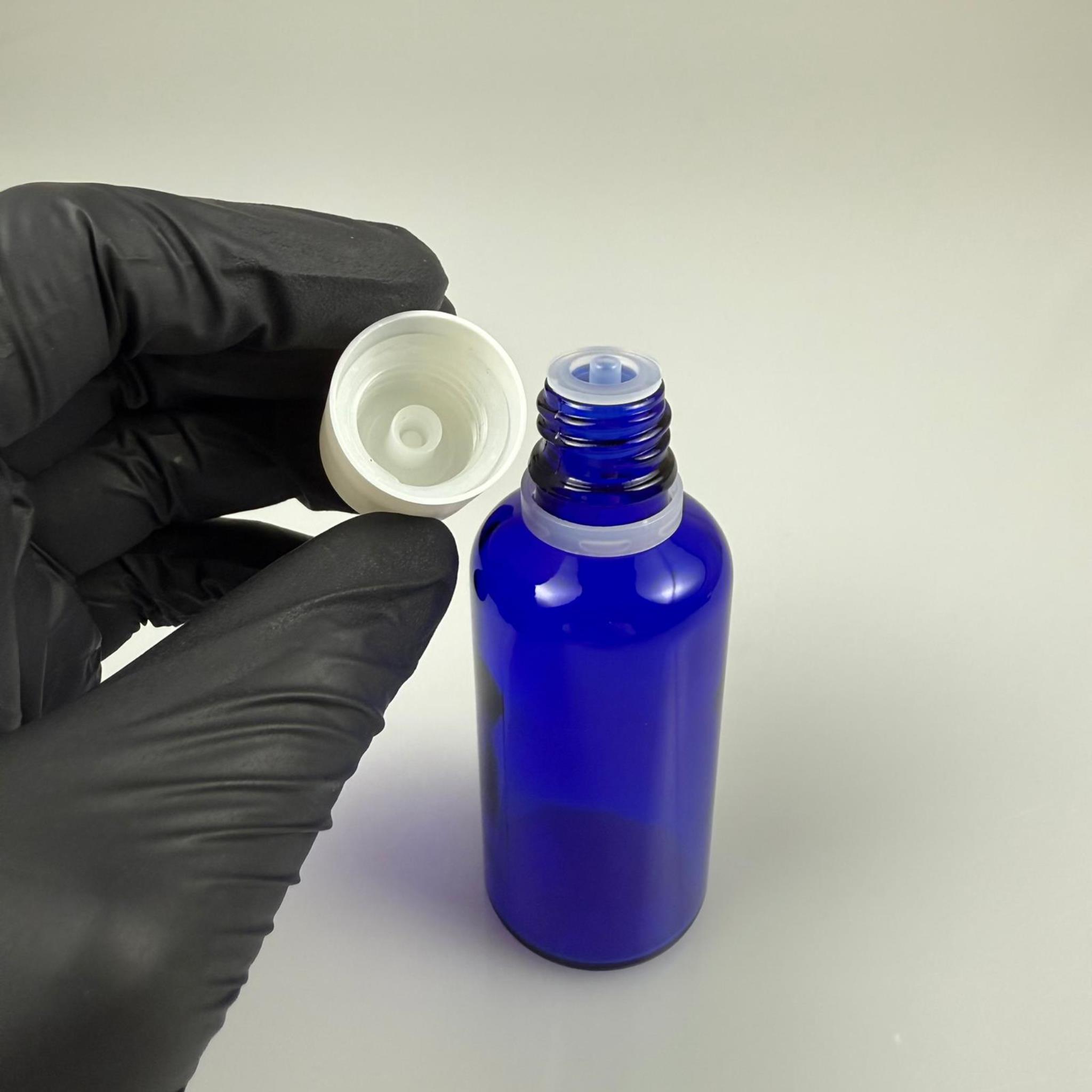 50 CC MAVİ CAM ŞİŞE + İÇTEN DAMLALIKLI ÇOCUK KİLİTLİ BEYAZ KAPAK - MAVİ 50 ML KİLİT KAPAKLI DAMLATMALI ŞİŞE