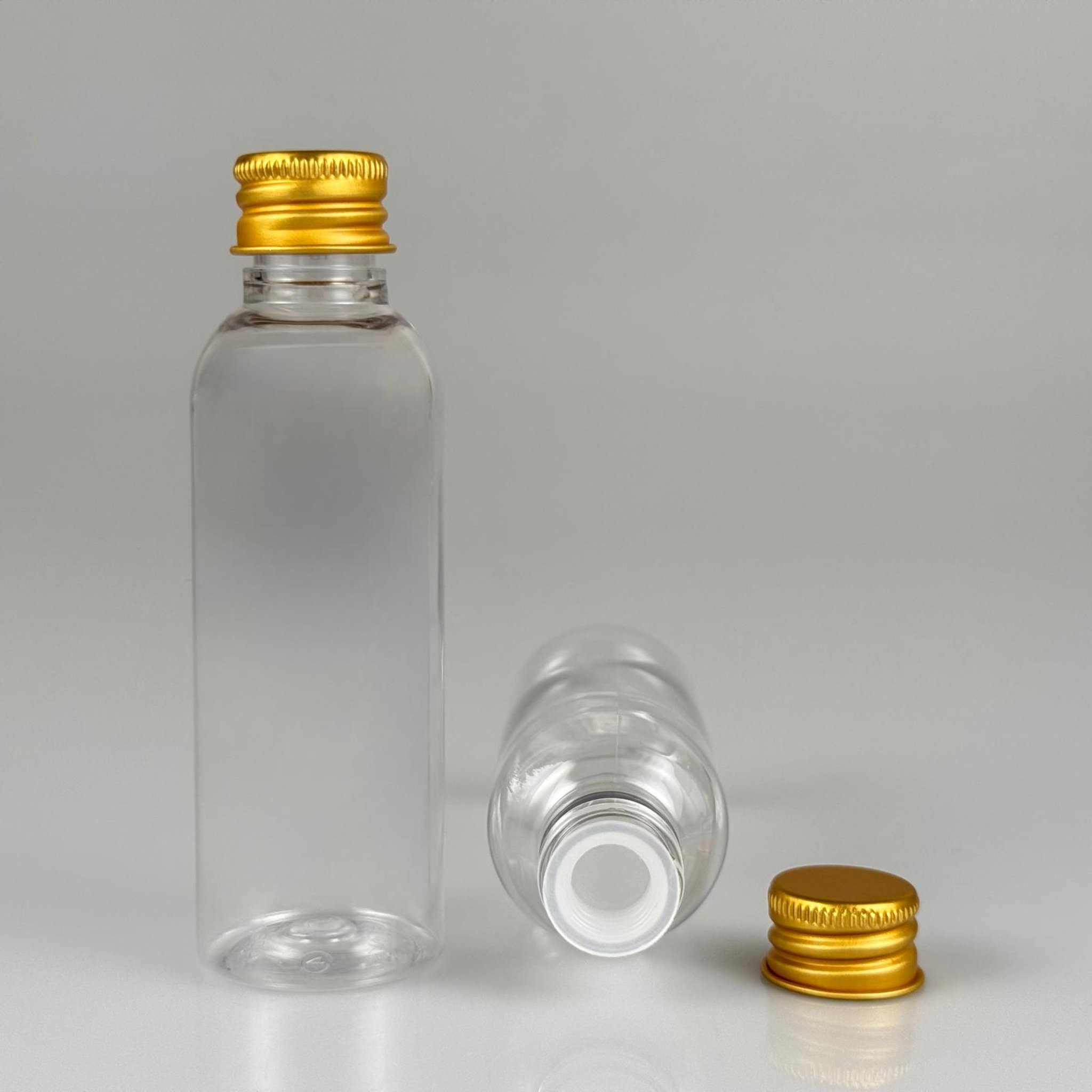 50 CC ŞEFFAF SİLİNDİR UZUN MODEL PET ŞİŞE + KÖPÜK CONTALI GOLD ALÜMİNYUM METAL KAPAKLI + KÖR TIPALI TAKIM - 50 ML PLASTİK ŞİŞE
