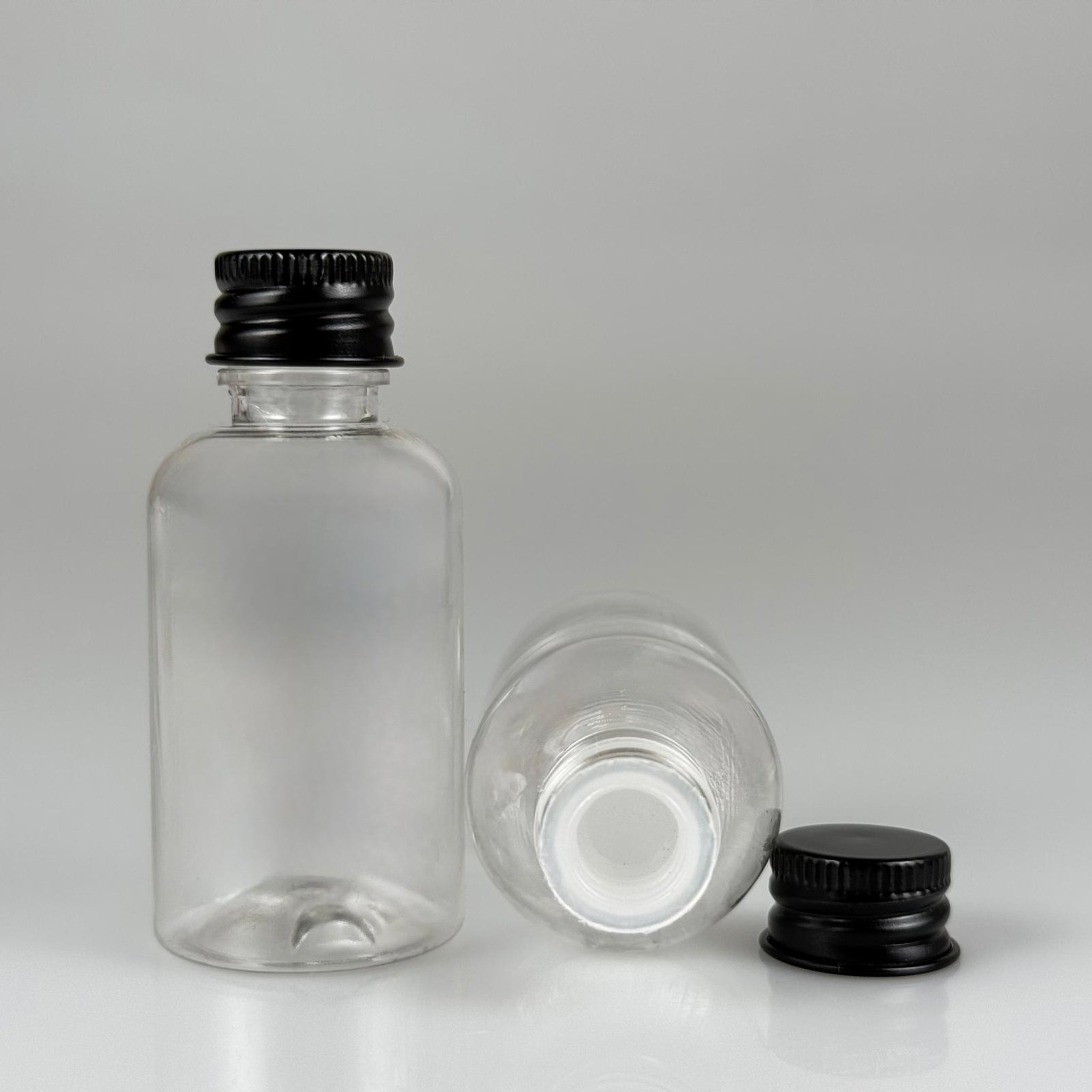 40 CC ŞEFFAF SİLİNDİR TOMBUL PET ŞİŞE + KÖPÜK CONTALI SİYAH ALÜMİNYUM METAL KAPAKLI + KÖR TIPALI TAKIM - 40 ML PLASTİK ŞİŞE