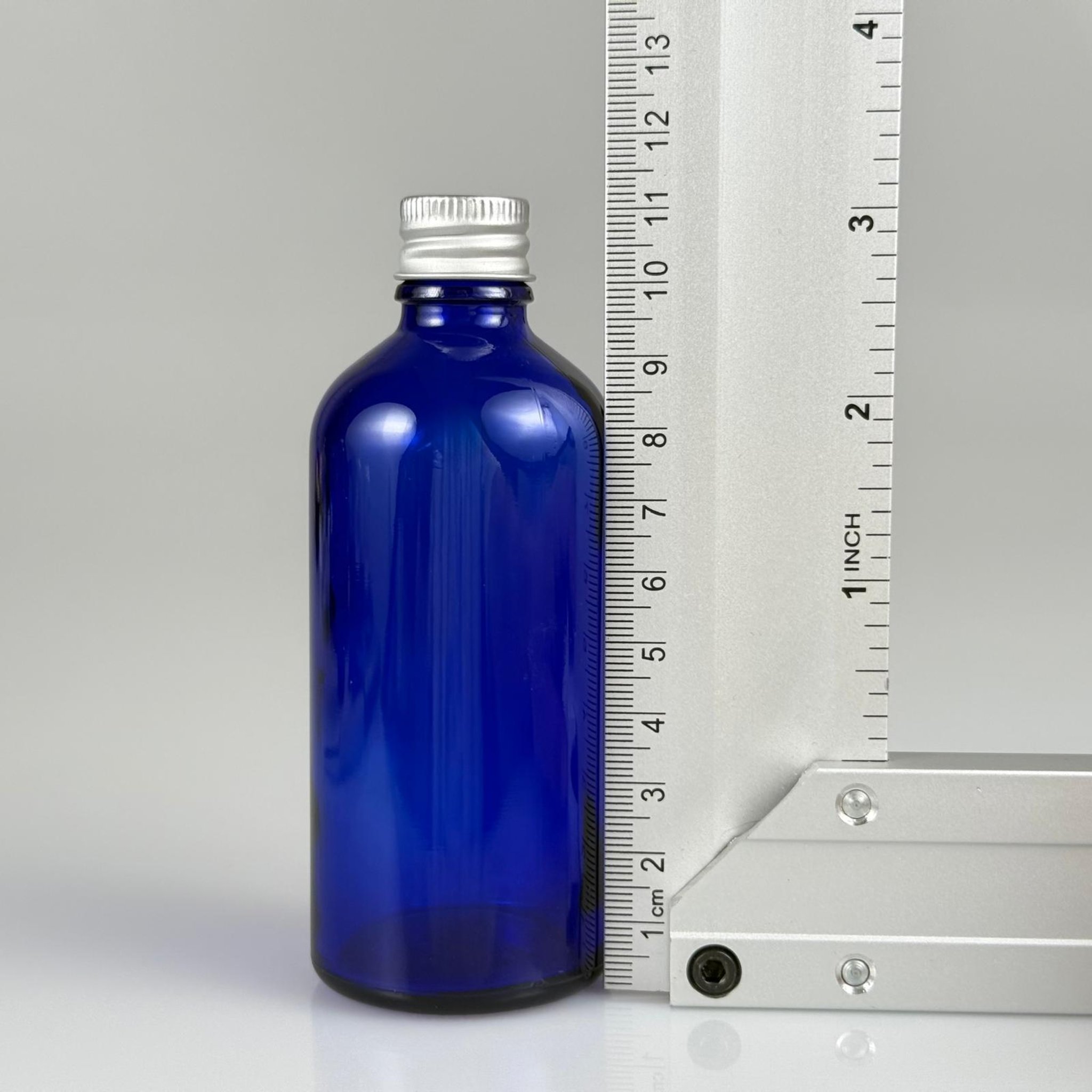 100 CC MAVİ CAM ŞİŞE + KÖPÜK CONTALI GÜMÜŞ ALÜMİNYUM METAL KAPAKLI TAKIM - 100 ML MAVİ CAM ŞİŞE
