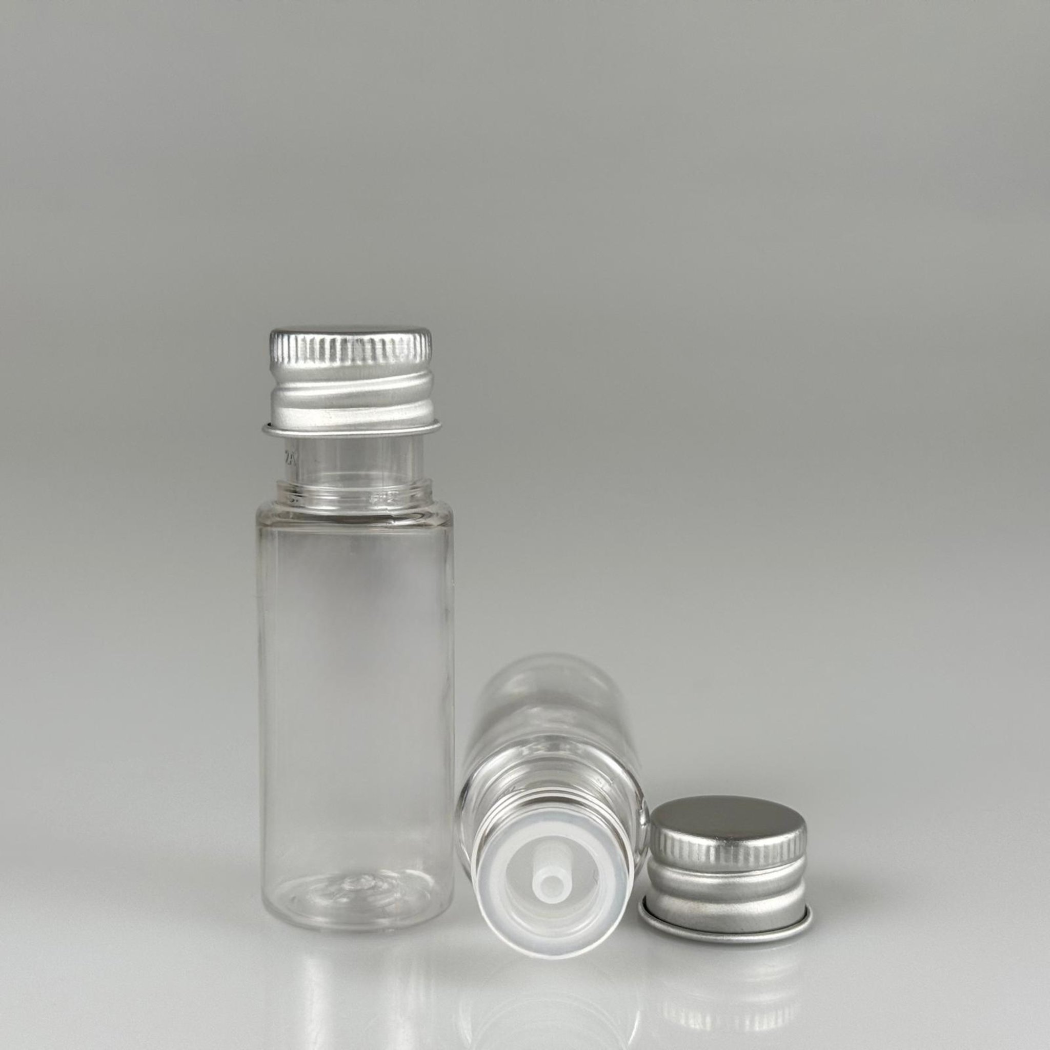 15 CC SİLİNDİR PET ŞİŞE + KÖPÜK CONTALI GÜMÜŞ ALÜMİNYUM METAL KAPAKLI + DAMLALIKLI KOLONYA TIPALI TAKIML - 15 ML ŞEFFAF PET ŞİŞE