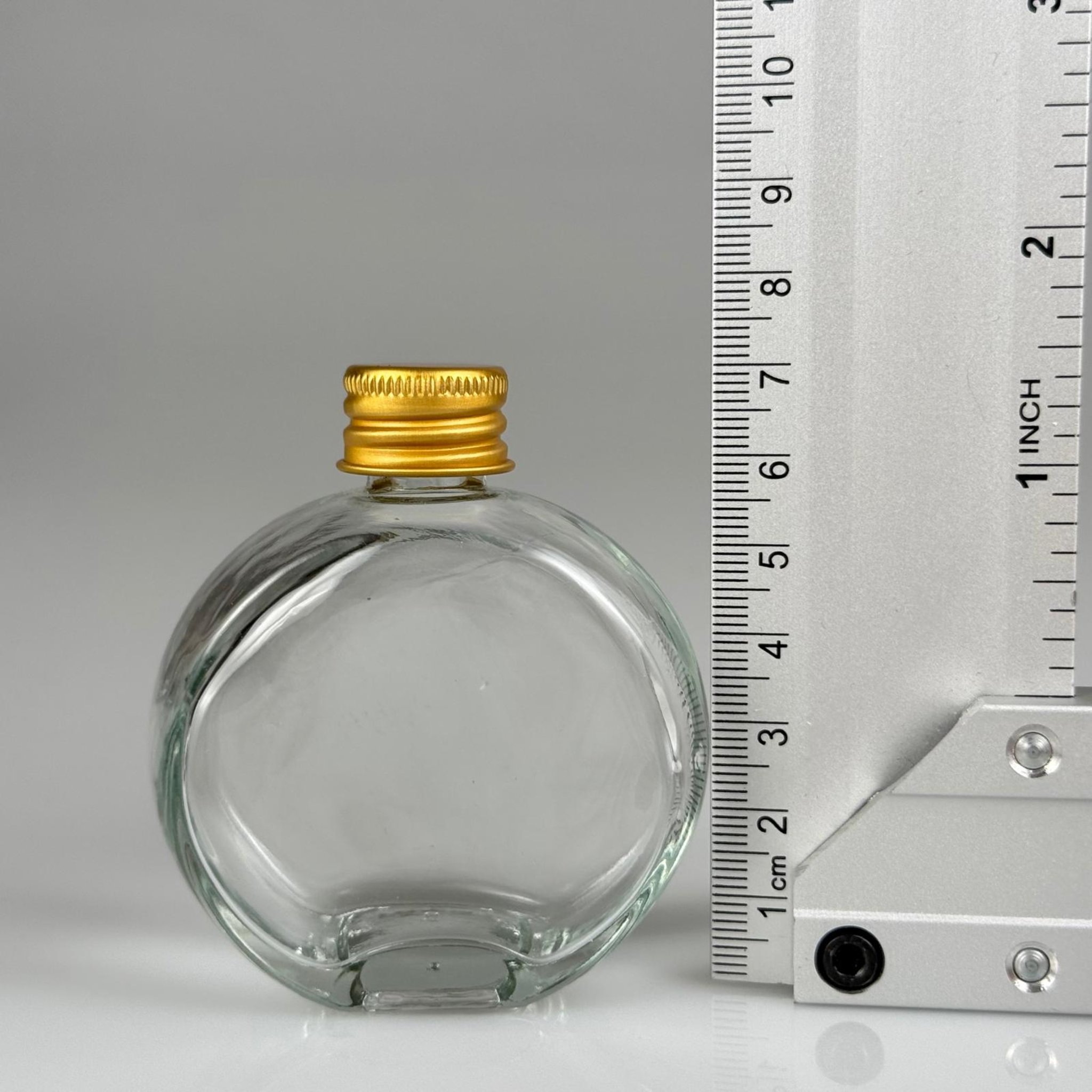50 CC OVAL YASSI YUVARLAK CAM ŞİŞE + GOLD ALÜMİNYUM METAL KAPAKLI TAKIM - 50 ML ŞEFFAF CAM ŞİŞE