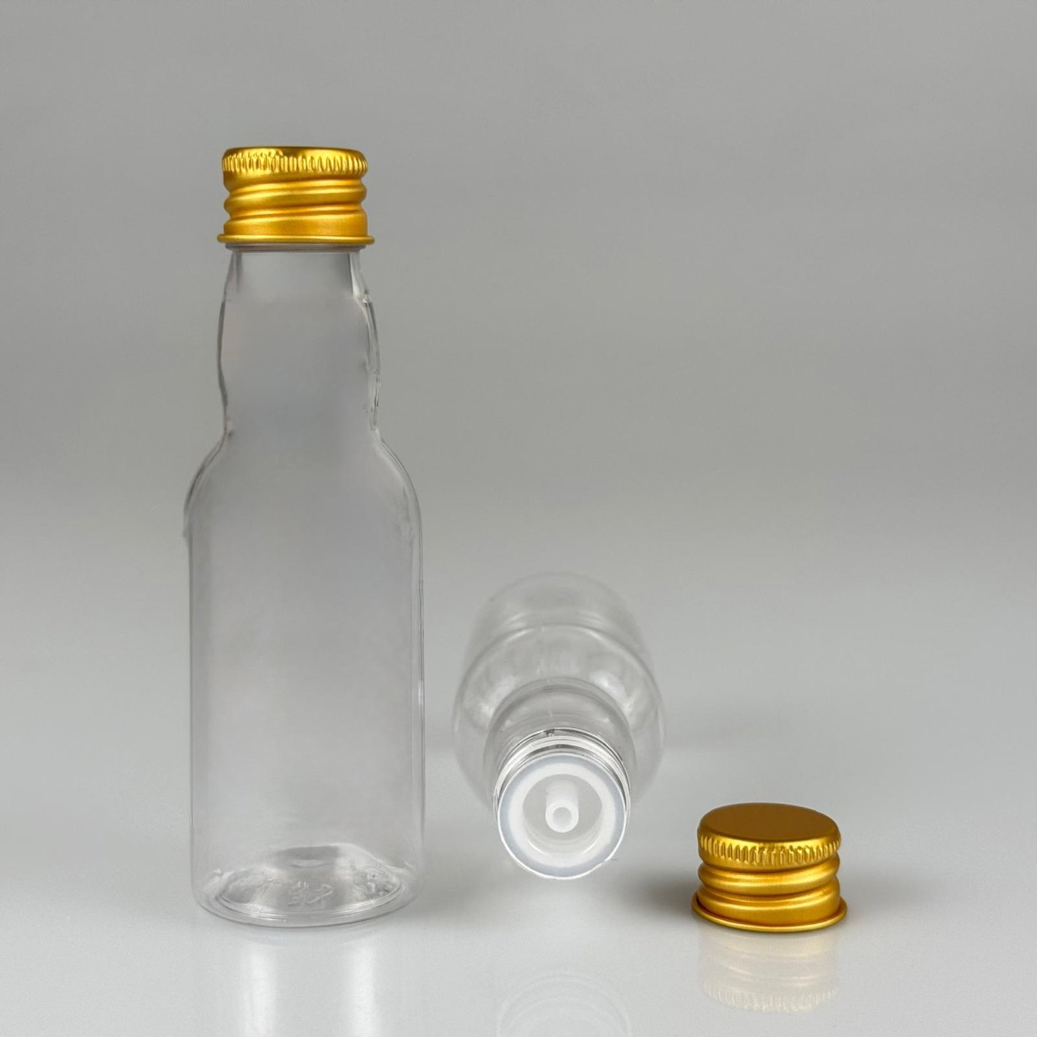 40 CC ŞEFFAF UZUN BOĞAZLI PET ŞİŞE + KÖPÜK CONTALI GOLD ALÜMİNYUM METAL KAPAKLI + DAMLALIKLI KOLONYA TIPALI TAKIM - 40 ML BOĞAZLI PET ŞİŞE