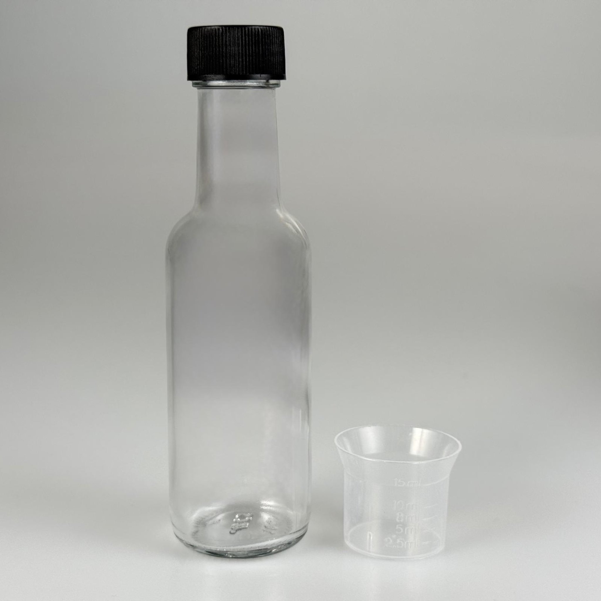 100 CC DORİKA CAM ŞİŞE + SİYAH CONTALI KAPAK + 15 ML ÖLÇEK TAKIM - 100 ML ŞEFFAF CAM DORİKA ŞİŞE