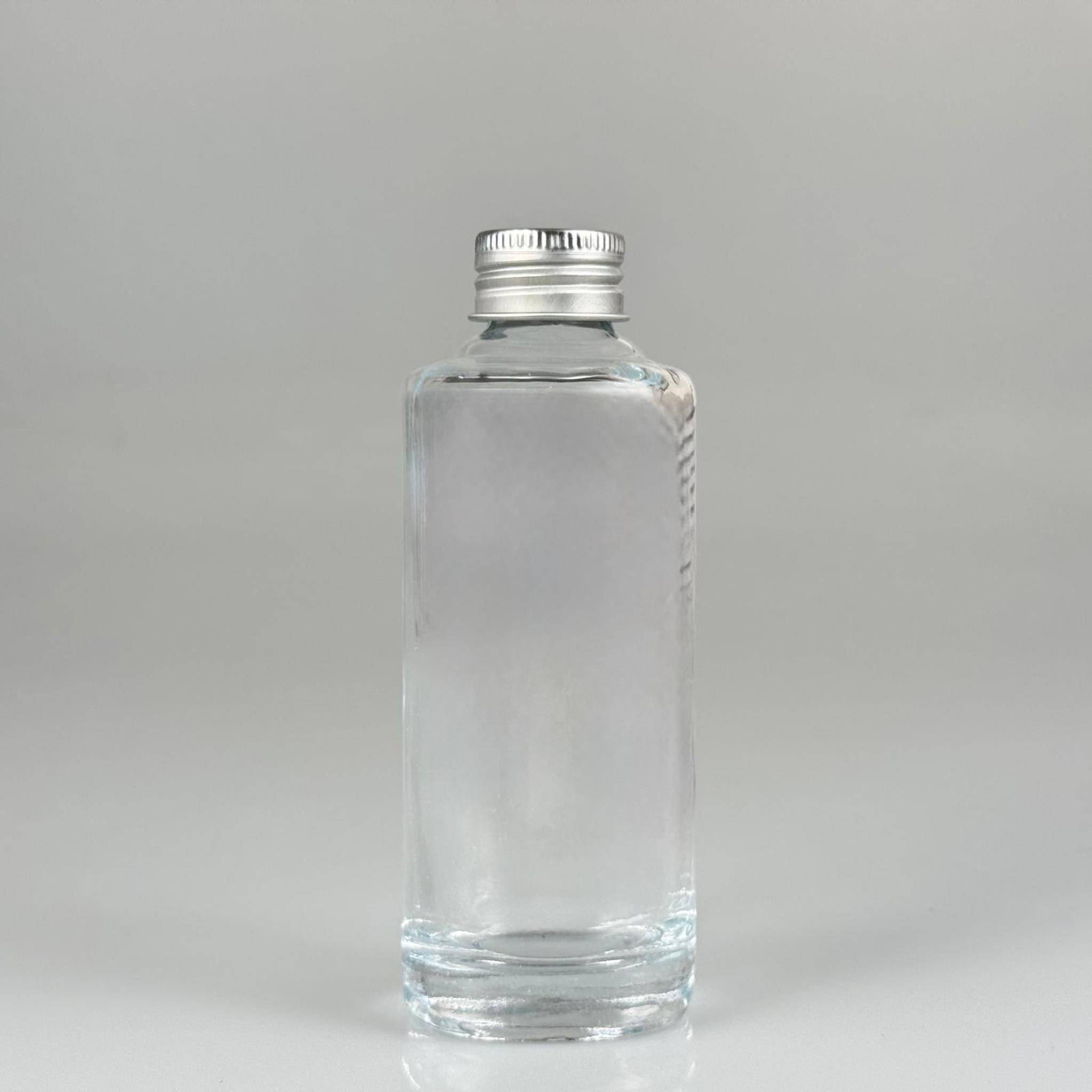 100 CC ŞEFFAF OVAL CAM ŞİŞE (24 AĞIZ) + KÖPÜK CONTALI GÜMÜŞ METAL ALÜMİNYUM KAPAK - 100 ML OVAL CAM ŞİŞE