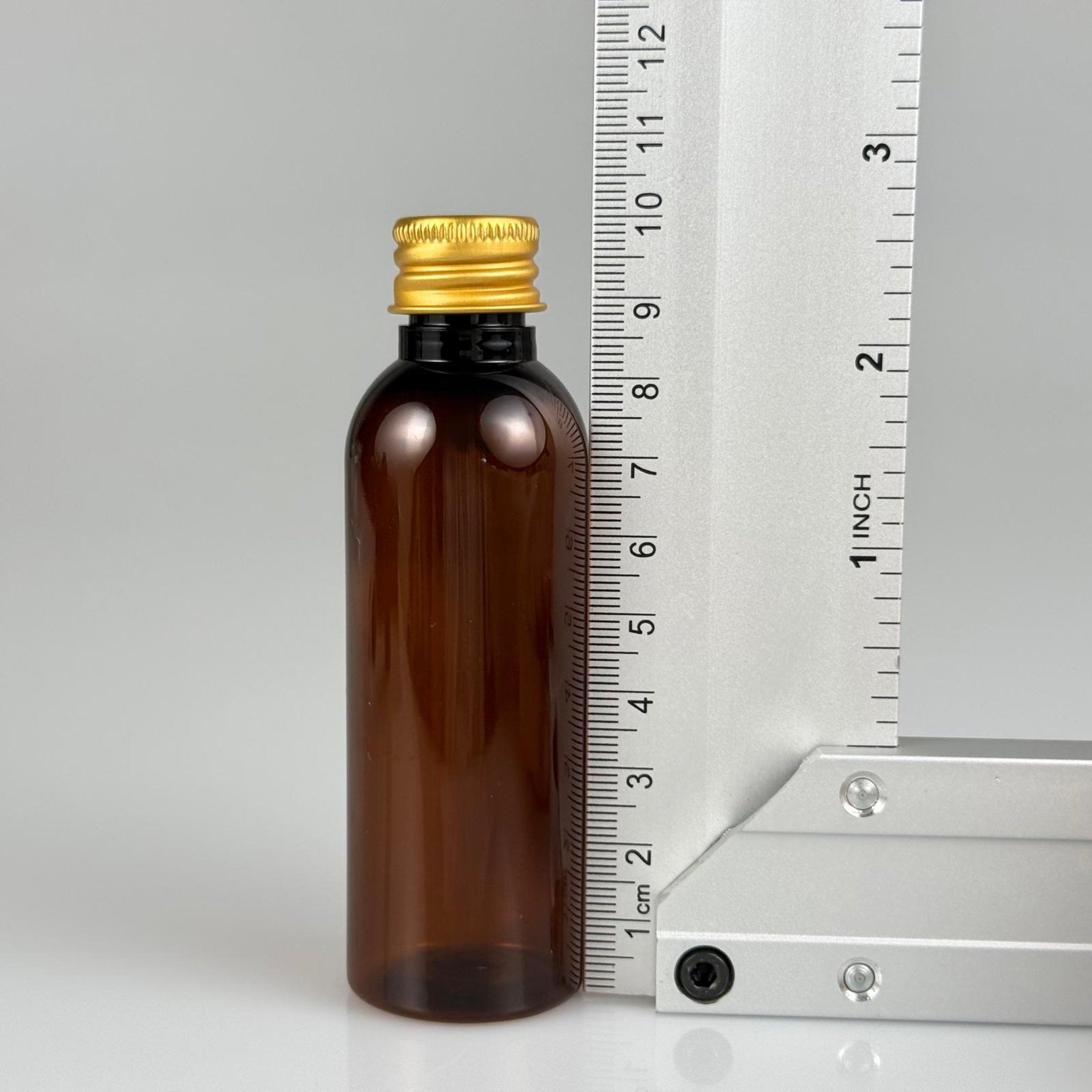50 CC AMBER SİLİNDİR UZUN MODEL PET ŞİŞE + KÖPÜK CONTALI GOLD ALÜMİNYUM METAL KAPAKLI + DAMLALIKLI KOLONYA TIPALI TAKIM - 50 ML KAHVERENGİ PLASTİK ŞİŞE