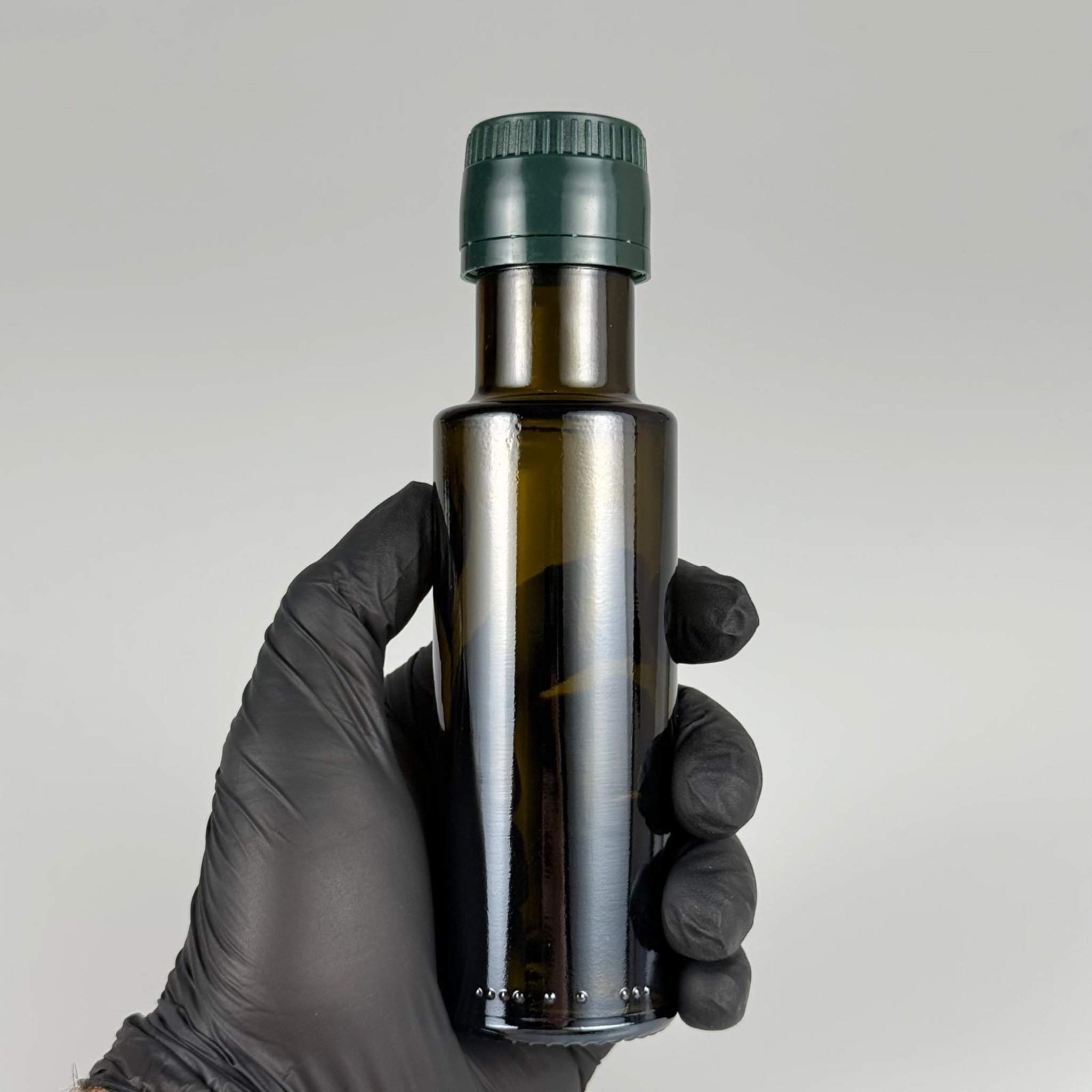 100 CC DORİKA CAM ŞİŞE KOYU YEŞİL (31 MM AĞIZ) - AKITICILI YEŞİL KİLİTLİ KAPAKLI - 100 ML SİLİNDİR DORİCA YAĞ VE SOS ŞİŞELERİ