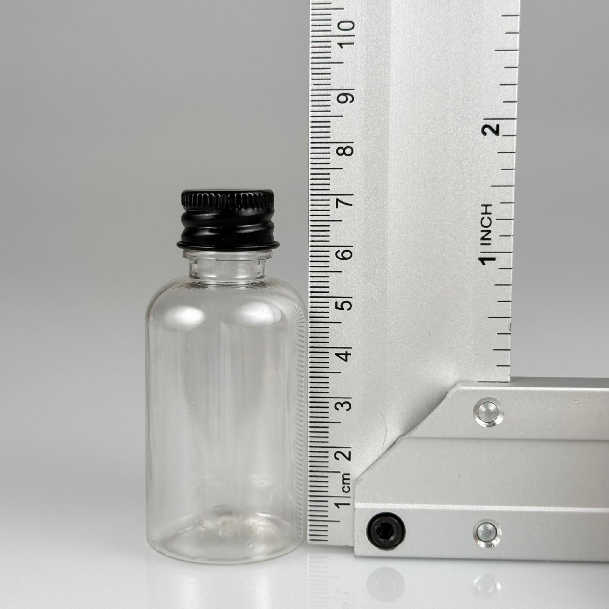 40 CC ŞEFFAF SİLİNDİR TOMBUL PET ŞİŞE + KÖPÜK CONTALI SİYAH ALÜMİNYUM METAL KAPAKLI + KÖR TIPALI TAKIM - 40 ML PLASTİK ŞİŞE