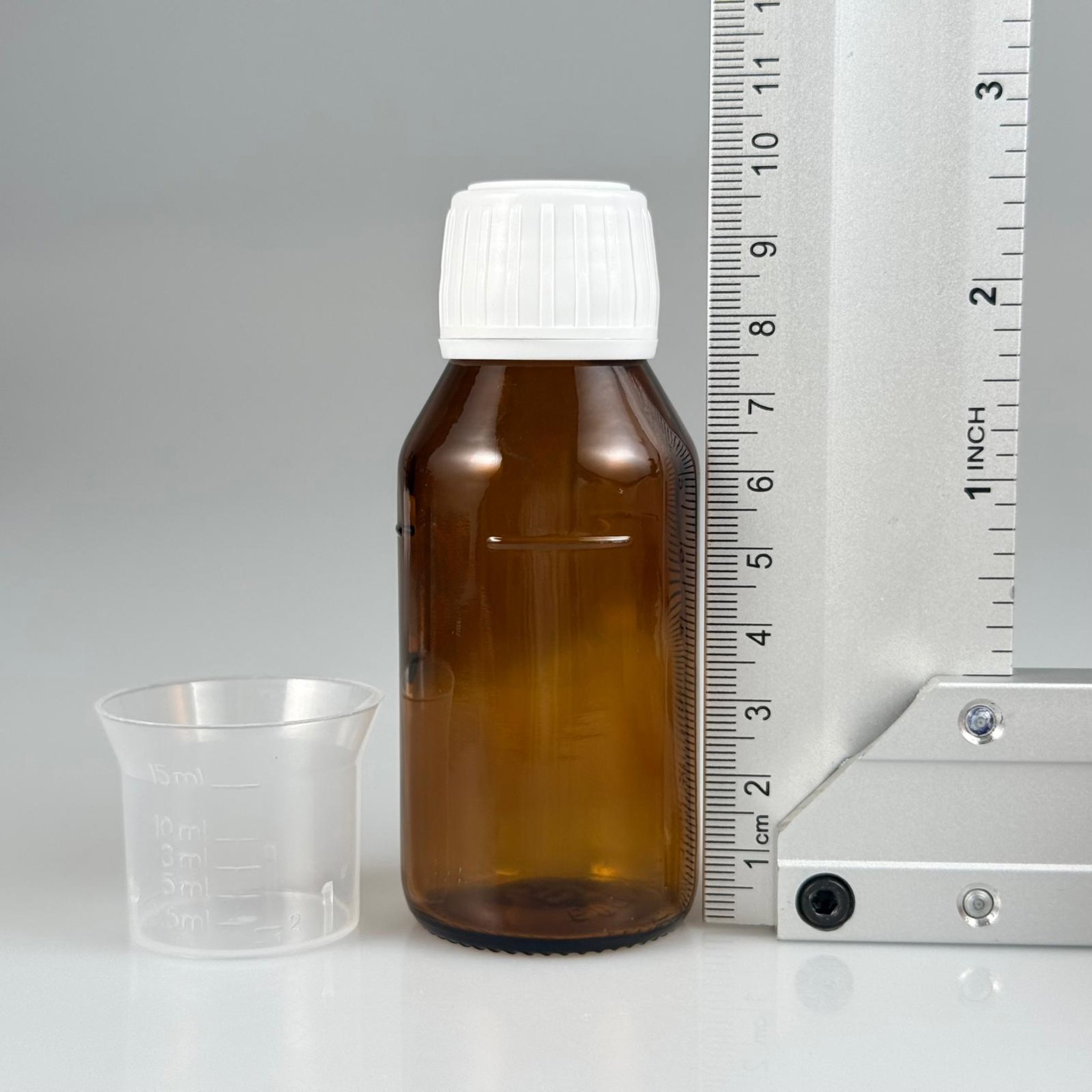 60 CC AMBER CAM ŞİŞE + BEYAZ KİLİTLİ KAPAK + 15 ML ÖLÇEK TAKIM - 60 ML KAHVERENGİ BOŞ ŞURUP ŞİŞESİ (AĞIZ ÇAPI 25 MM)