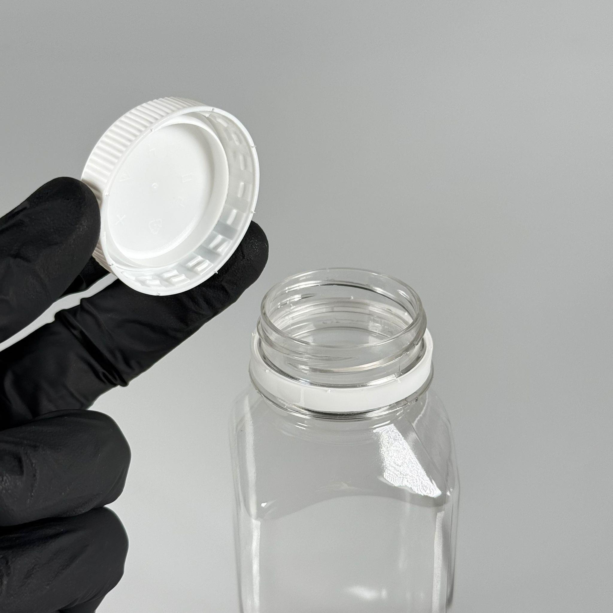 250 CC KÖŞELİ KARE PET ŞİŞE (18,5 GR) - 38 MM GENİŞ AĞIZLI BEYAZ KİLİTLİ KAPAKLI - 250 ML DETOX, MEYVE SUYU, SMOOTHIE, AYRAN, SÜT, MEŞRUBAT VB İÇİN BOŞ PLASTİK ŞİŞELER