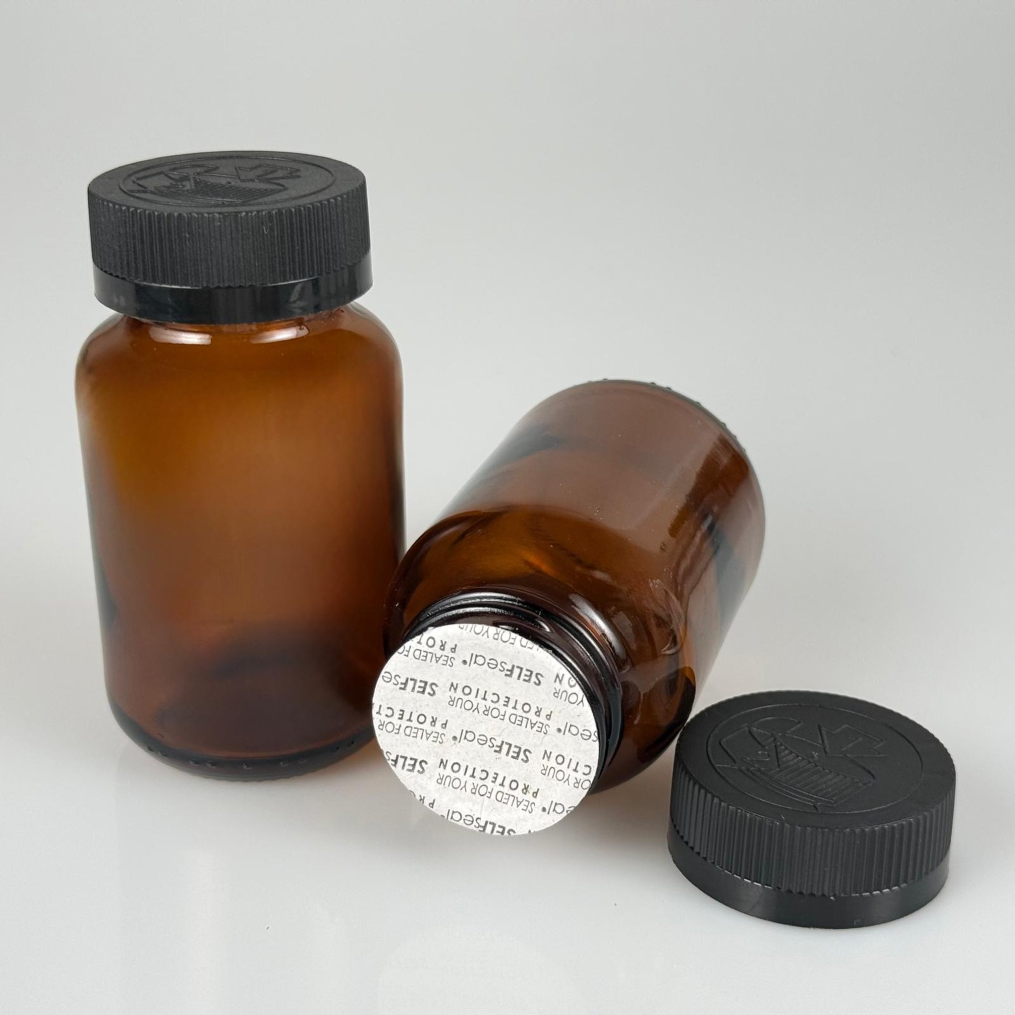 120 CC AMBER CAM TABLET ŞİŞESİ + 38 SİYAH ÇOCUK KİLİTLİ KAPAK + KÖPÜK CONTALI TAKIM - 120 ML (SİLME 133 ML) KAPSÜL KUTUSU - İLAÇ ŞİŞESİ - MEDİKAL HAP ŞİŞESİ - FARMASÖTİK KAVANOZ