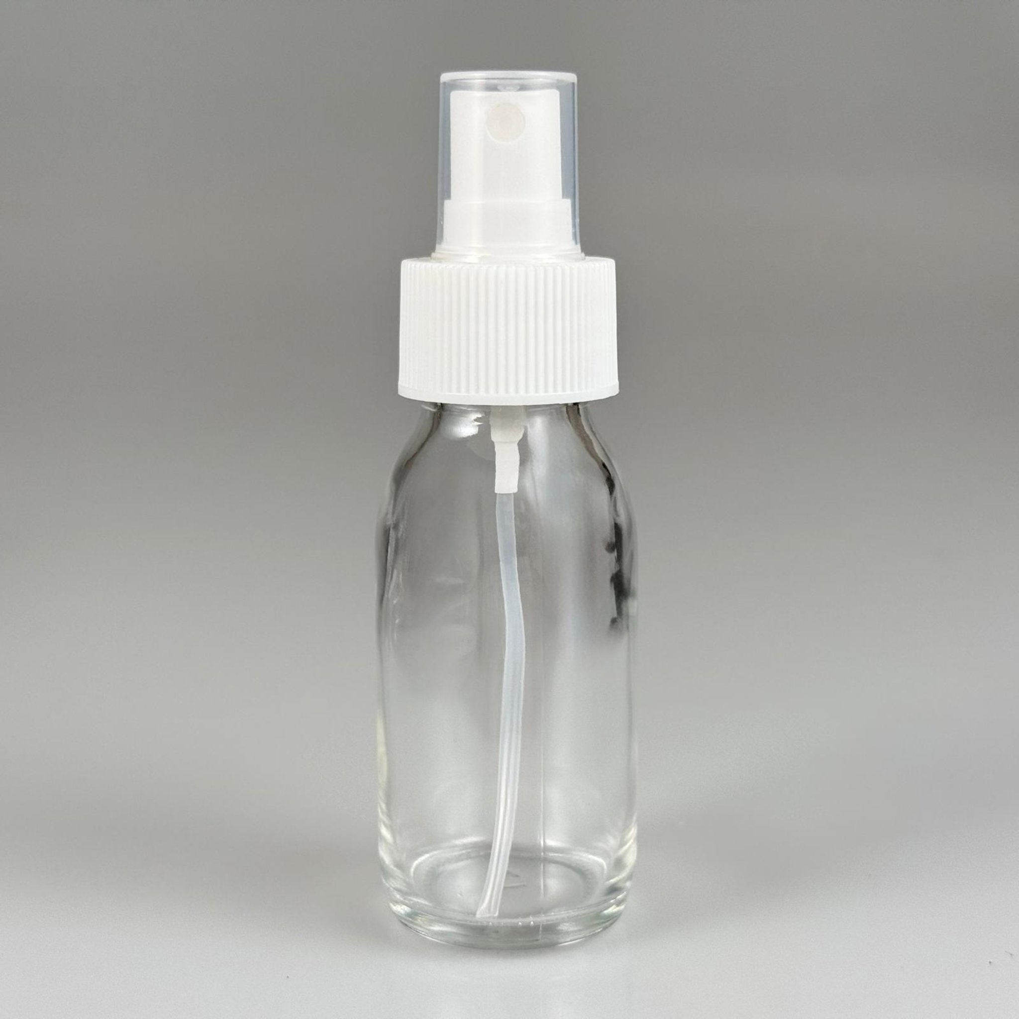 60 CC GENİŞ AĞIZLI ŞEFFAF CAM ŞİŞE BEYAZ SPREYLİ TAKIM - 60 ML ŞEFFAF ŞURUP ECZA ŞİŞESİ - MİKROPLARDAN KORUNMASI İÇİN İLAÇLANMIŞTIR, SUYA TUTUNCA ŞEFFAF RENGİ ALIR