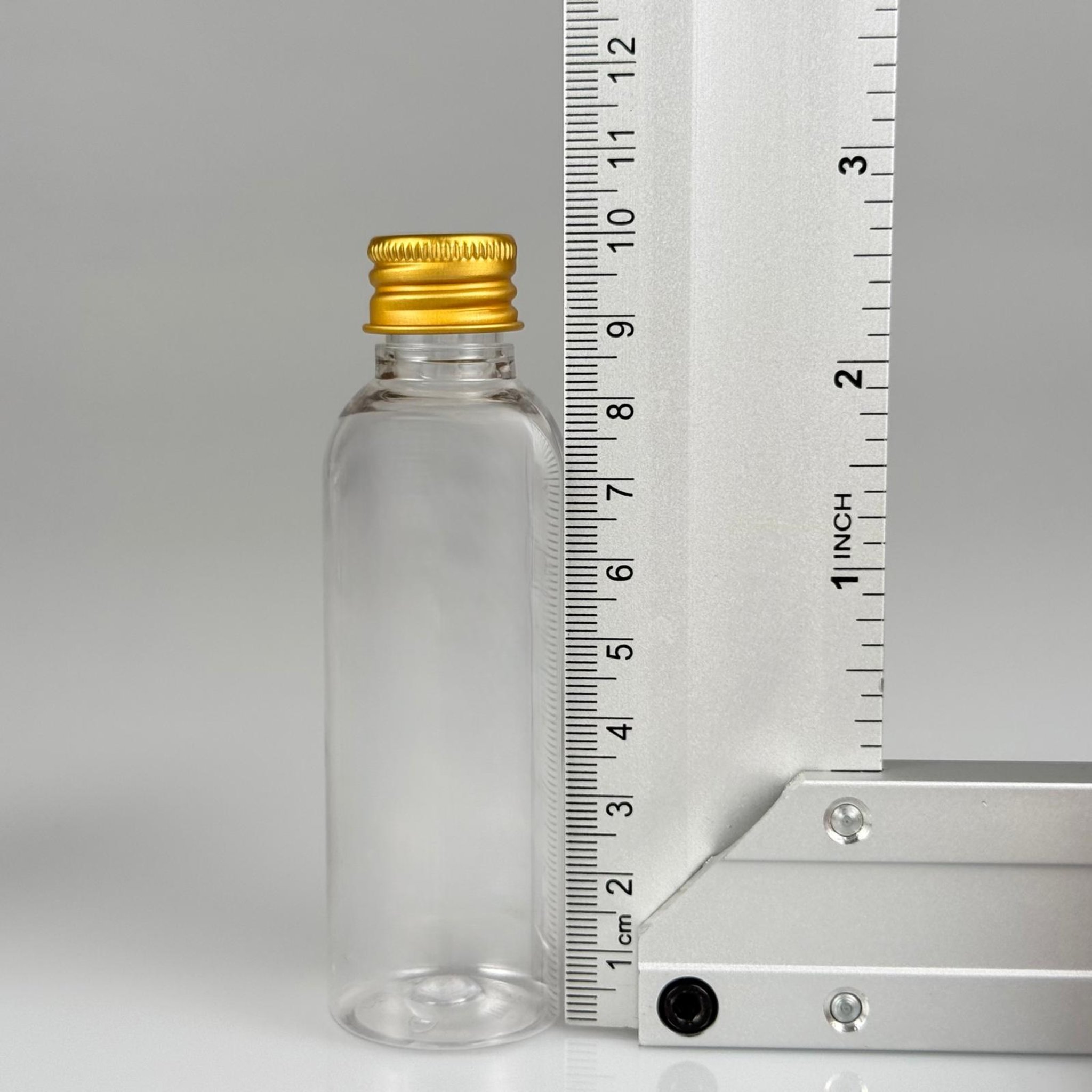 50 CC ŞEFFAF SİLİNDİR UZUN MODEL PET ŞİŞE + KÖPÜK CONTALI GOLD ALÜMİNYUM METAL KAPAKLI + KÖR TIPALI TAKIM - 50 ML PLASTİK ŞİŞE