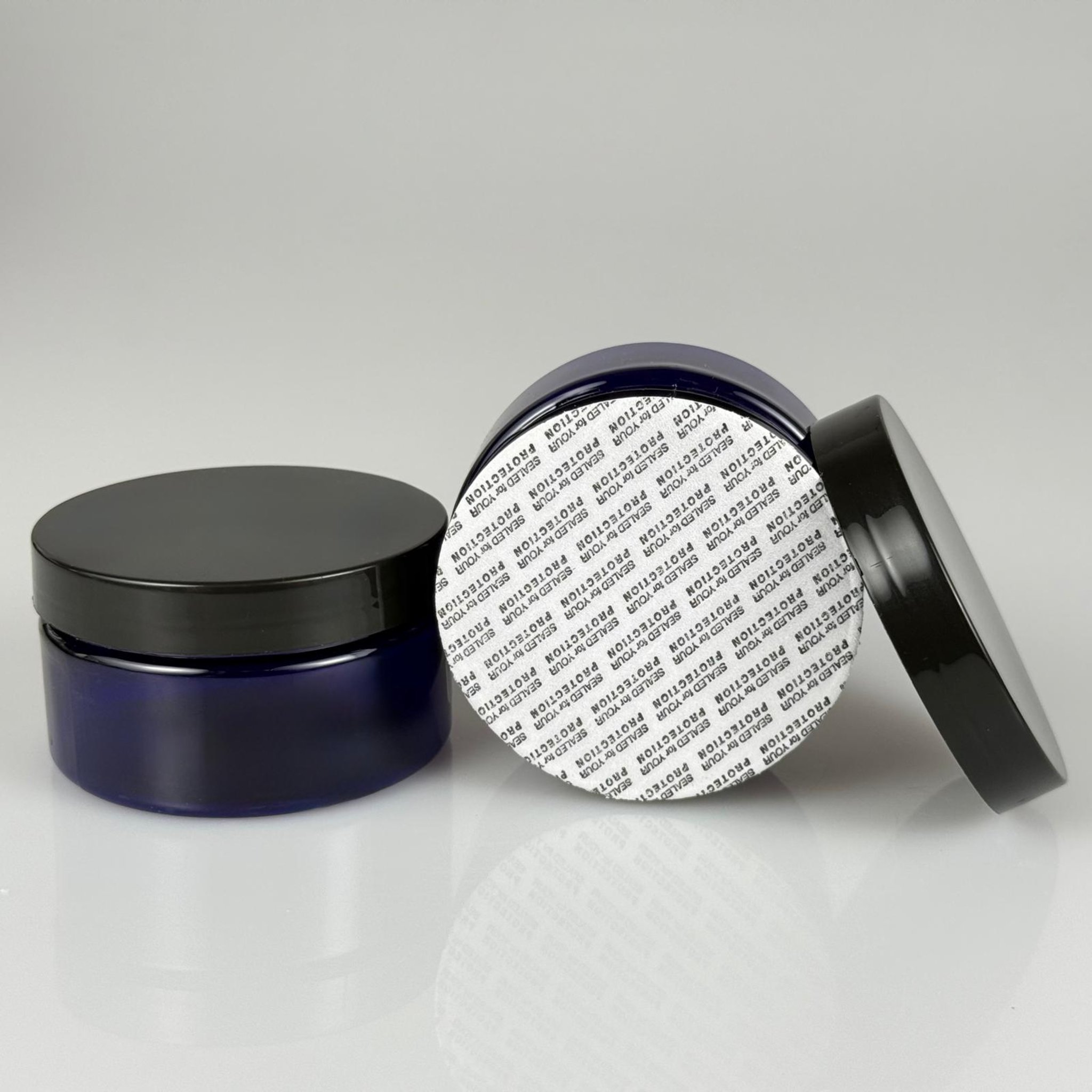 100 CC MAVİ SERT PLASTİK KAVANOZ + SİYAH PLASTİK KAPAKLI + KENDİNDEN YAPIŞKANLI KÖPÜK CONTALI TAKIM - 100 ML PLASTİK KREM KAVANOZU