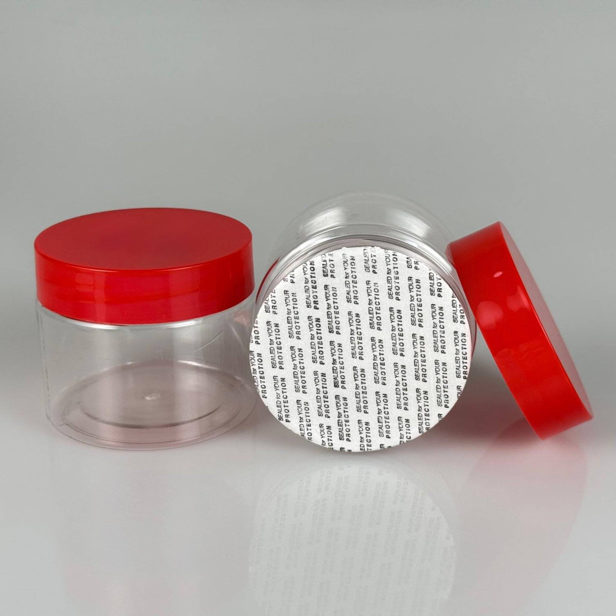 100 CC PET KAVANOZ + KIRMIZI PLASTİK KAPAKLI + KENDİNDEN YAPIŞKANLI KÖPÜK CONTALI TAKIM - 100 ML PLASTİK KAVANOZ