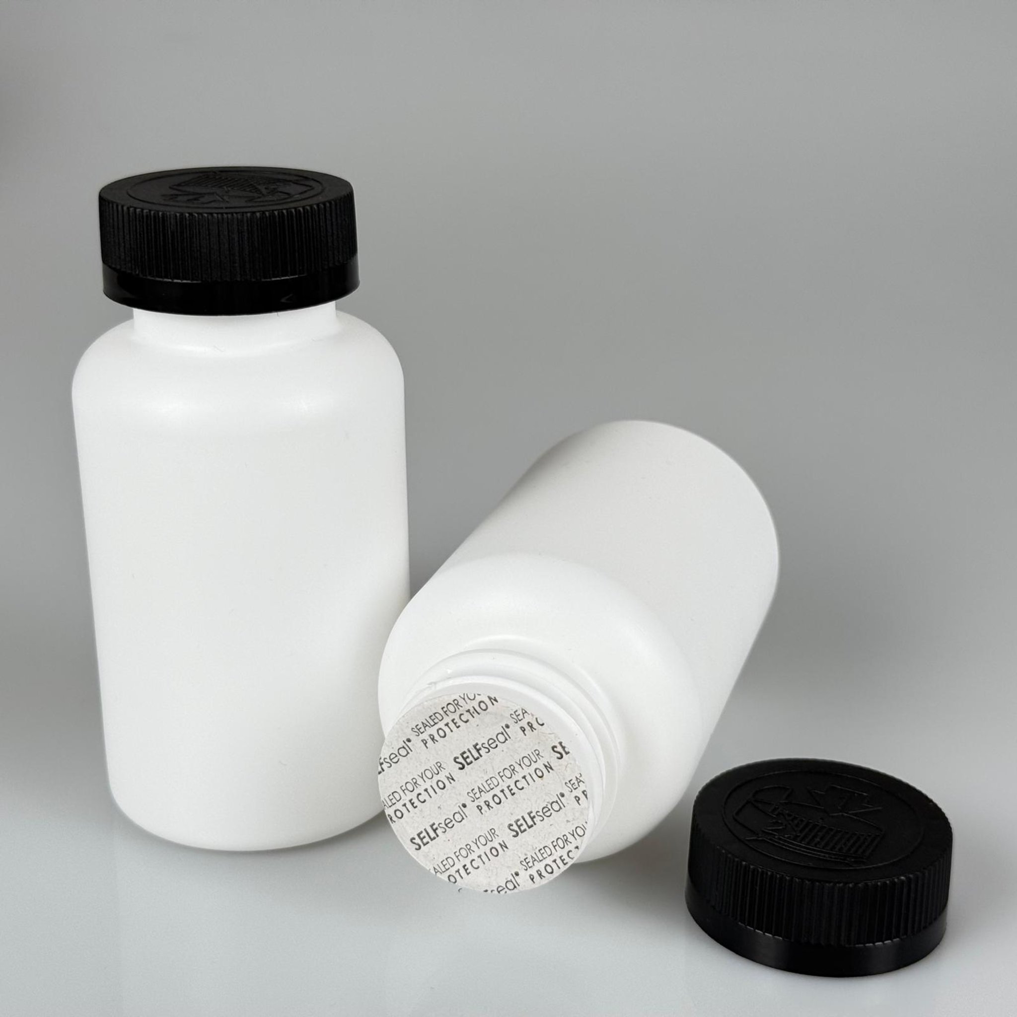 200 ML CONTALI ÇOCUK KİLİT KAPAKLI TABLET ŞİŞESİ  - 200 CC BEYAZ POLİETİLEN HDPE KAVANOZ + 38 MM SİYAH ÇOCUK KİLİTLİ KAPAK + KENDİNDEN YAPIŞKANLI KÖPÜK CONTA TAKIM -  KAPSÜL KUTUSU - İLAÇ ŞİŞESİ - MEDİKAL HAP ŞİŞESİ - FARMASÖTİK KAVANOZ