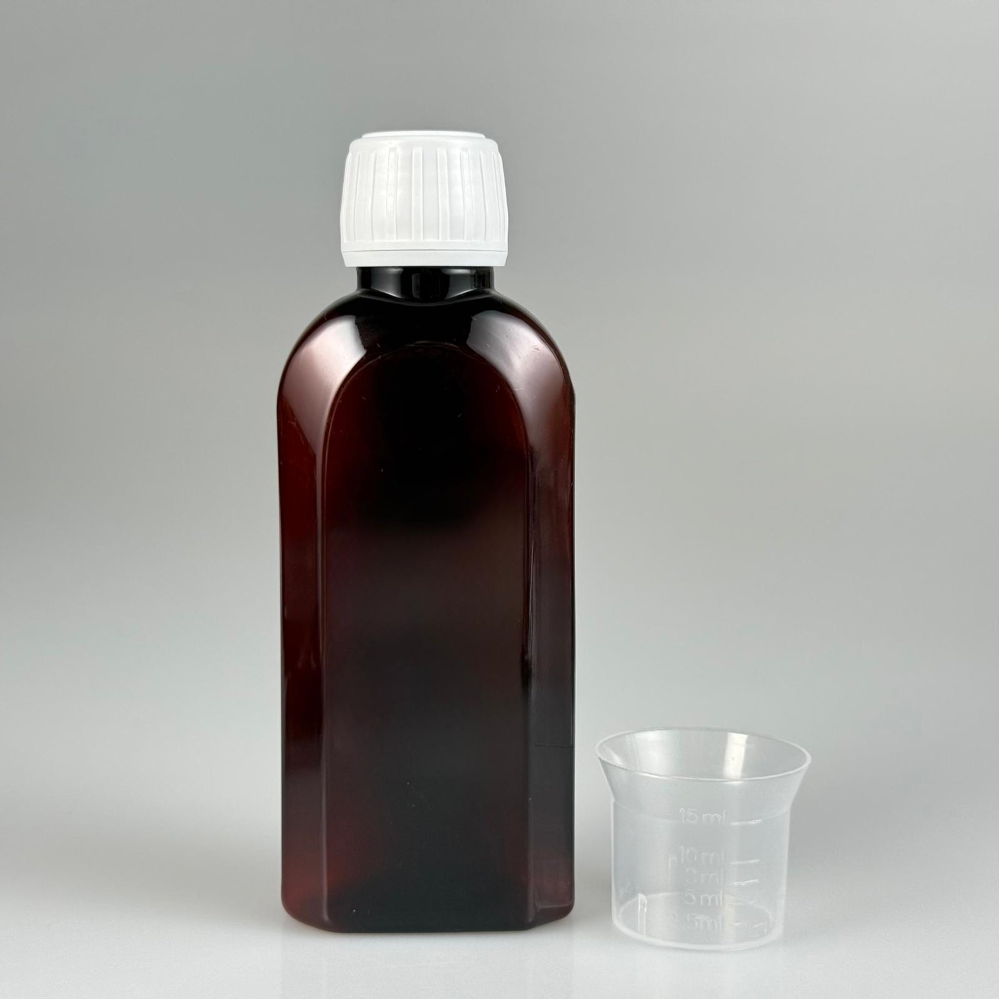 125 CC AMBER YASSI PET ŞİŞE + BEYAZ KİLİTLİ KAPAKLI + 15 ML ÖLÇEK TAKIM - 125 ML YASSI PLASTİK KAHVERENGİ ŞİŞE - PLASTİK ECZA ŞİŞESİ - PET ŞURUP ŞİŞESİ