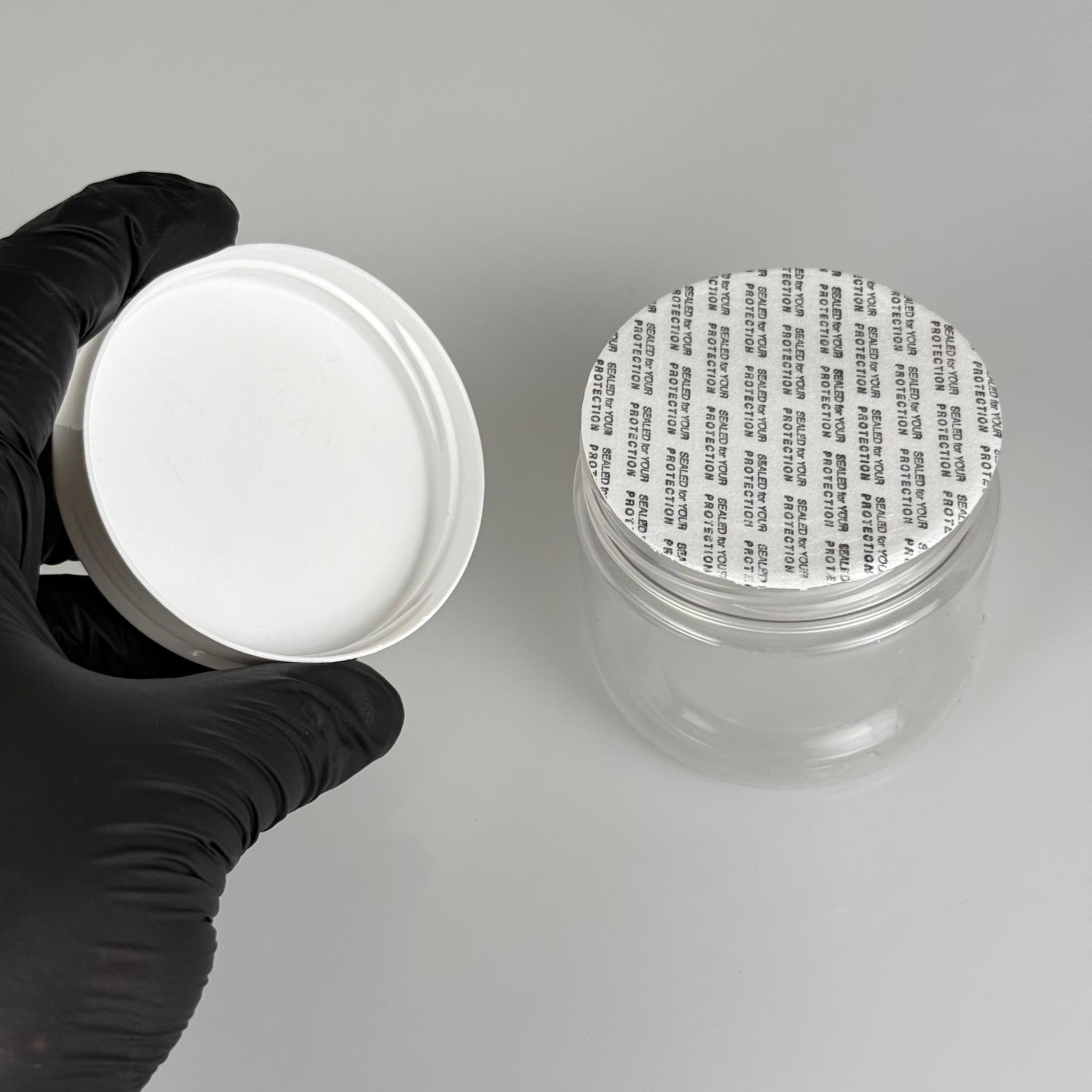 100 CC PET KAVANOZ + BEYAZ PLASTİK KAPAKLI + KENDİNDEN YAPIŞKANLI KÖPÜK CONTALI TAKIM - 100 ML PLASTİK KAVANOZ