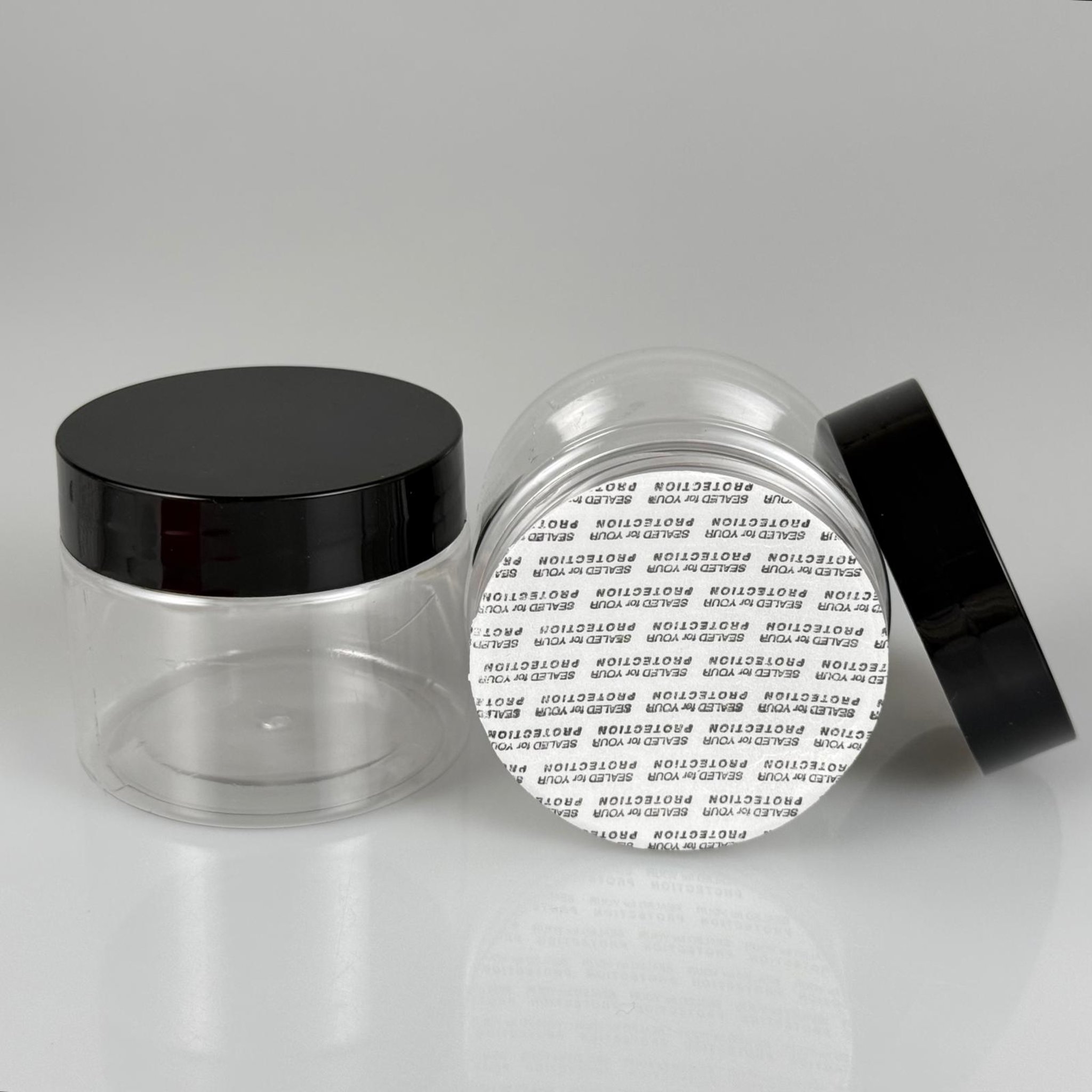 100 CC PET KAVANOZ + SİYAH PLASTİK KAPAKLI + KENDİNDEN YAPIŞKANLI KÖPÜK CONTALI TAKIM - 100 ML PLASTİK KAVANOZ