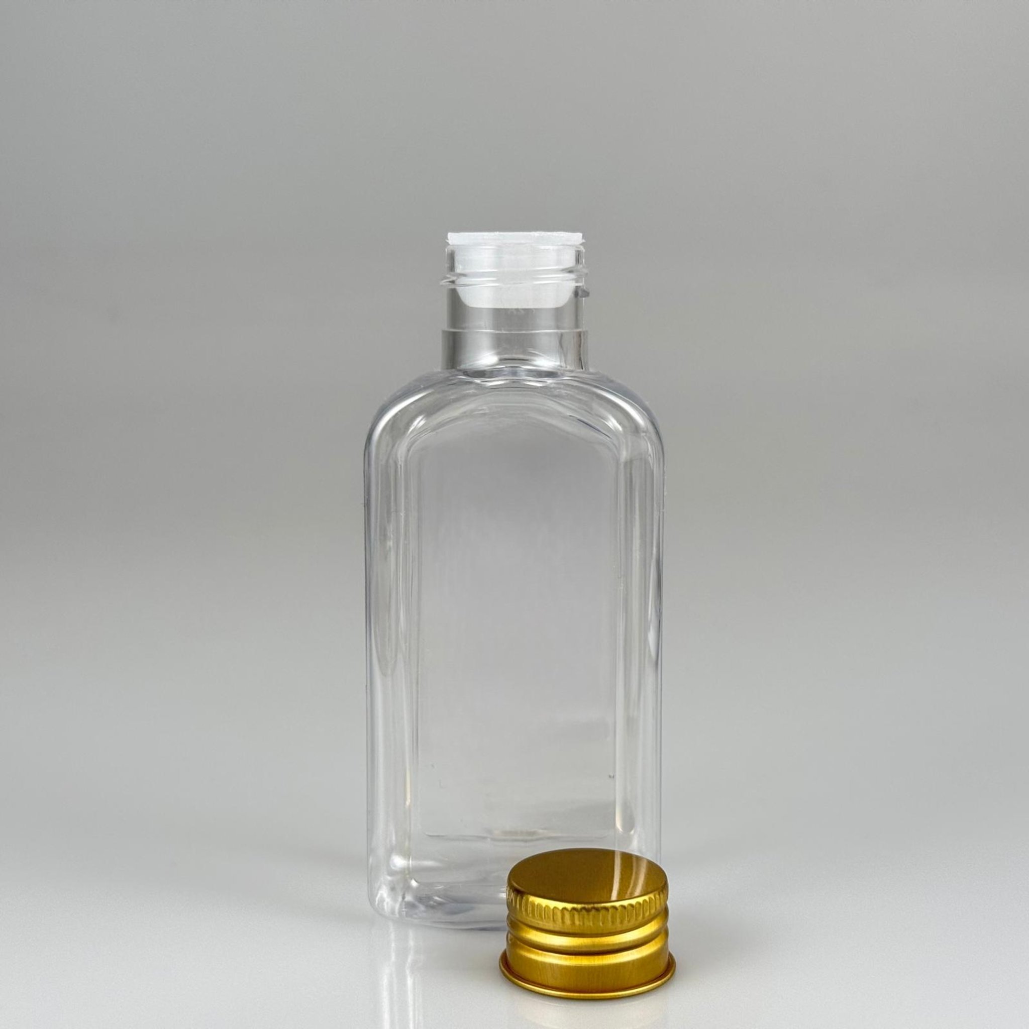100 CC YASSI KÖŞELİ MODEL ŞEFFAF PET ŞİŞE (24 AĞIZ) + KÖPÜK CONTALI GOLD METAL ALÜMİNYUM KAPAK + KOLONYA TIPALI TAKIM - 100 ML KAPAKLI PLASTİK ŞİŞELER