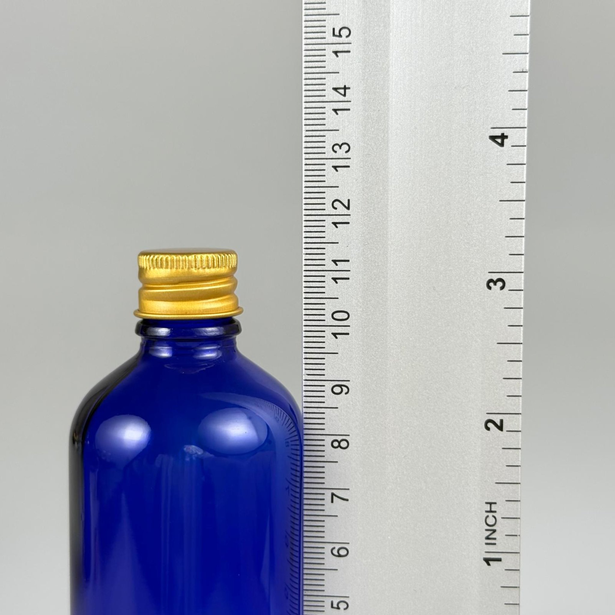 100 CC MAVİ CAM ŞİŞE + KÖPÜK CONTALI GOLD ALÜMİNYUM METAL + KOLONYA TIPALI KAPAKLI TAKIM - 100 ML MAVİ CAM ŞİŞE