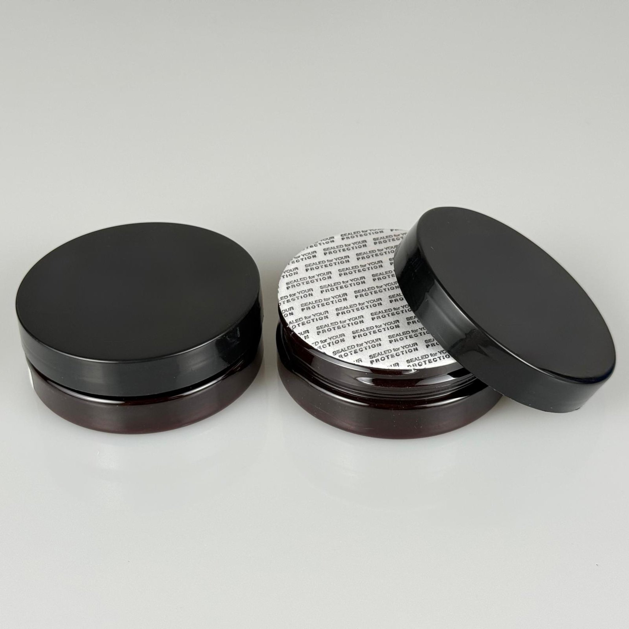 50 CC AMBER SERT PLASTİK KAVANOZ + SİYAH PLASTİK KAPAKLI +KENDİNDEN YAPIŞKANLI KÖPÜK CONTALI TAKIM - 50 ML PLASTİK KREM KAVANOZU