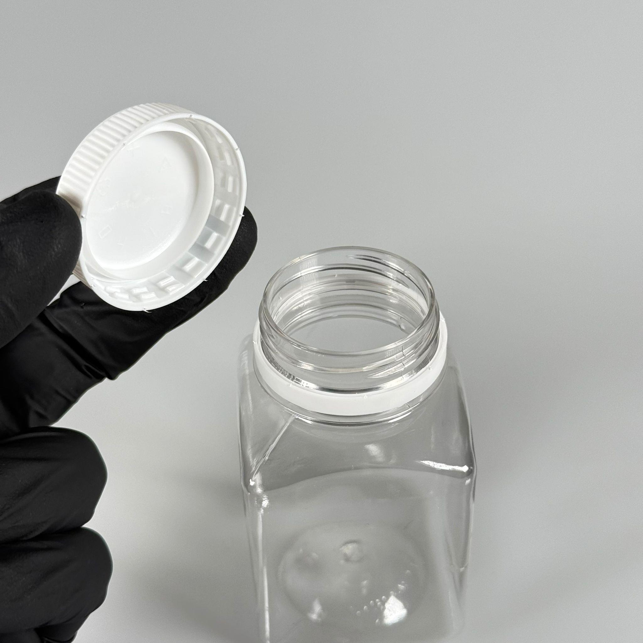 150 CC KÖŞELİ KARE PET ŞİŞE (15,6 GR) - 38 MM GENİŞ AĞIZLI KİLİTLİ BEYAZ - 150 ML DETOX, MEYVE SUYU, SMOOTHIE, AYRAN, SÜT, MEŞRUBAT VB İÇİN BOŞ PLASTİK ŞİŞELER