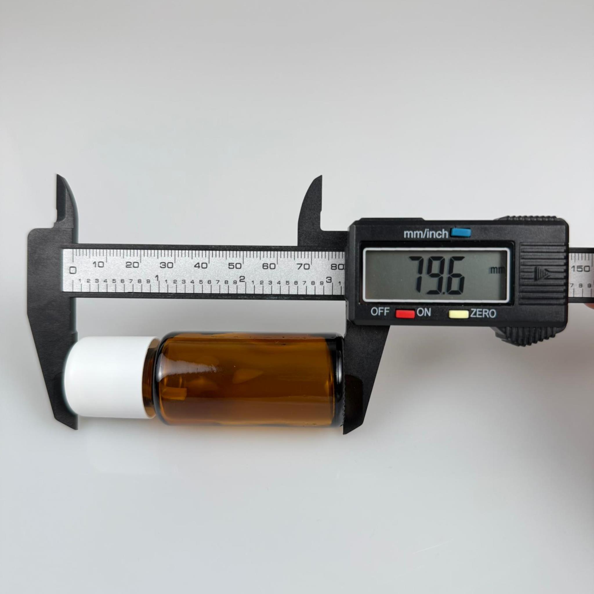 20 CC AMBER CAM ŞİŞE + İÇTEN DAMLALIKLI ÇOCUK KİLİTLİ BEYAZ KAPAK - KAHVERENGİ 20 ML KİLİT KAPAKLI DAMLATMALI ŞİŞE