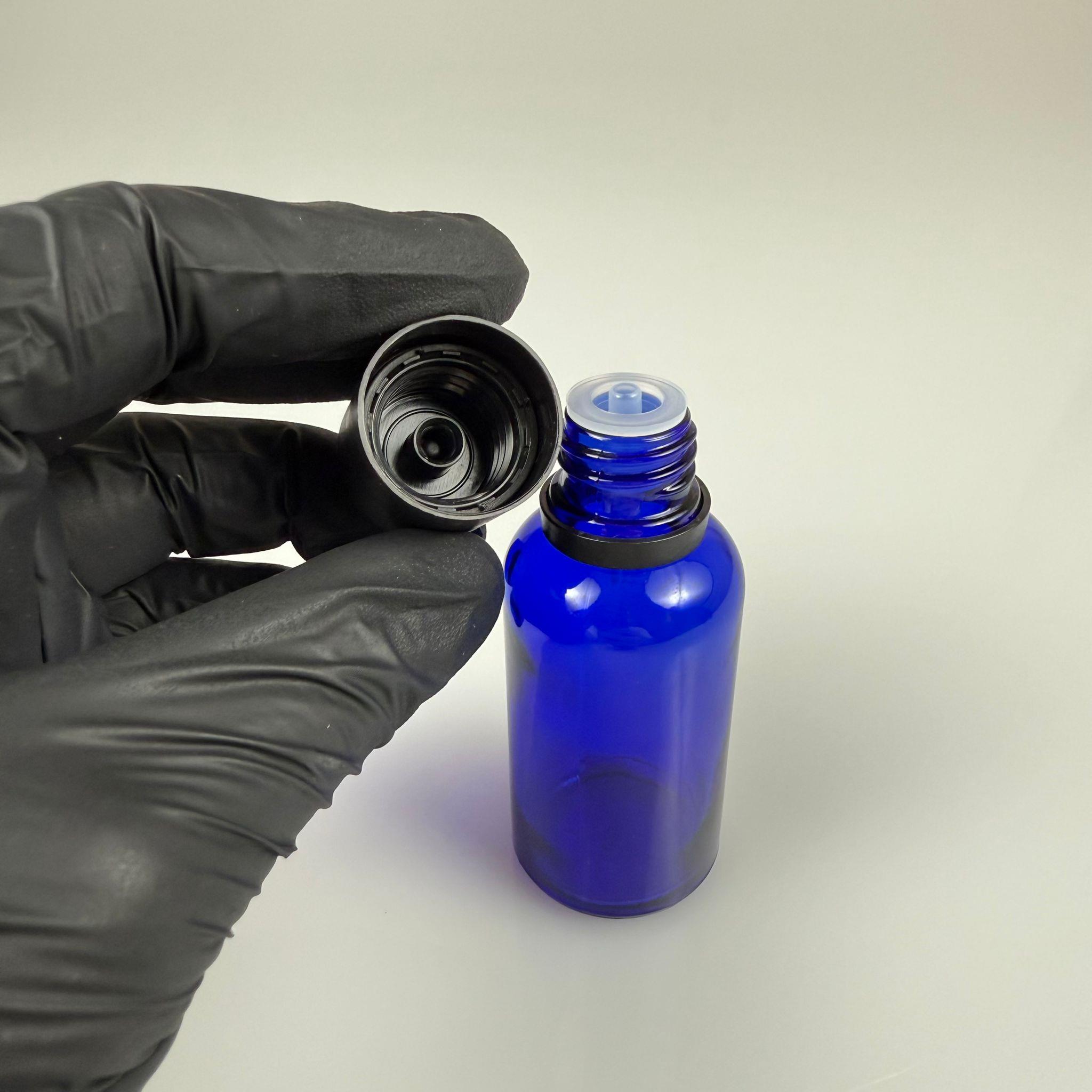 30 CC MAVİ CAM ŞİŞE + İÇTEN DAMLALIKLI ÇOCUK KİLİTLİ SİYAH KAPAK - MAVİ 30 ML KİLİT KAPAKLI DAMLATMALI ŞİŞE
