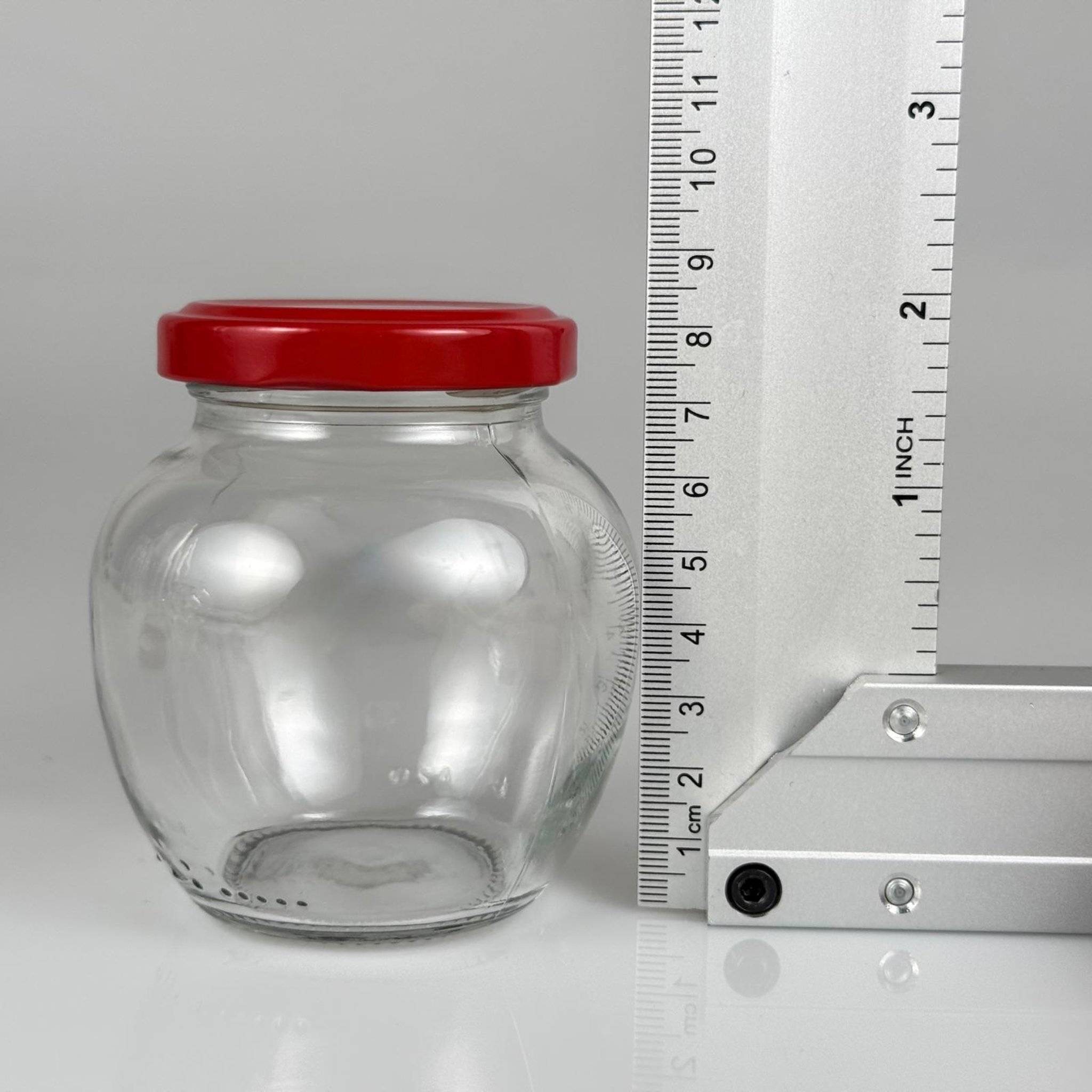210 CC YUMURTA KAVANOZ + KIRMIZI METAL KAPAKLI + KENDİNDEN YAPIŞKANLI KÖPÜK CONTALI TAKIM - 210 ML OVAL TİP CAM KAVANOZ