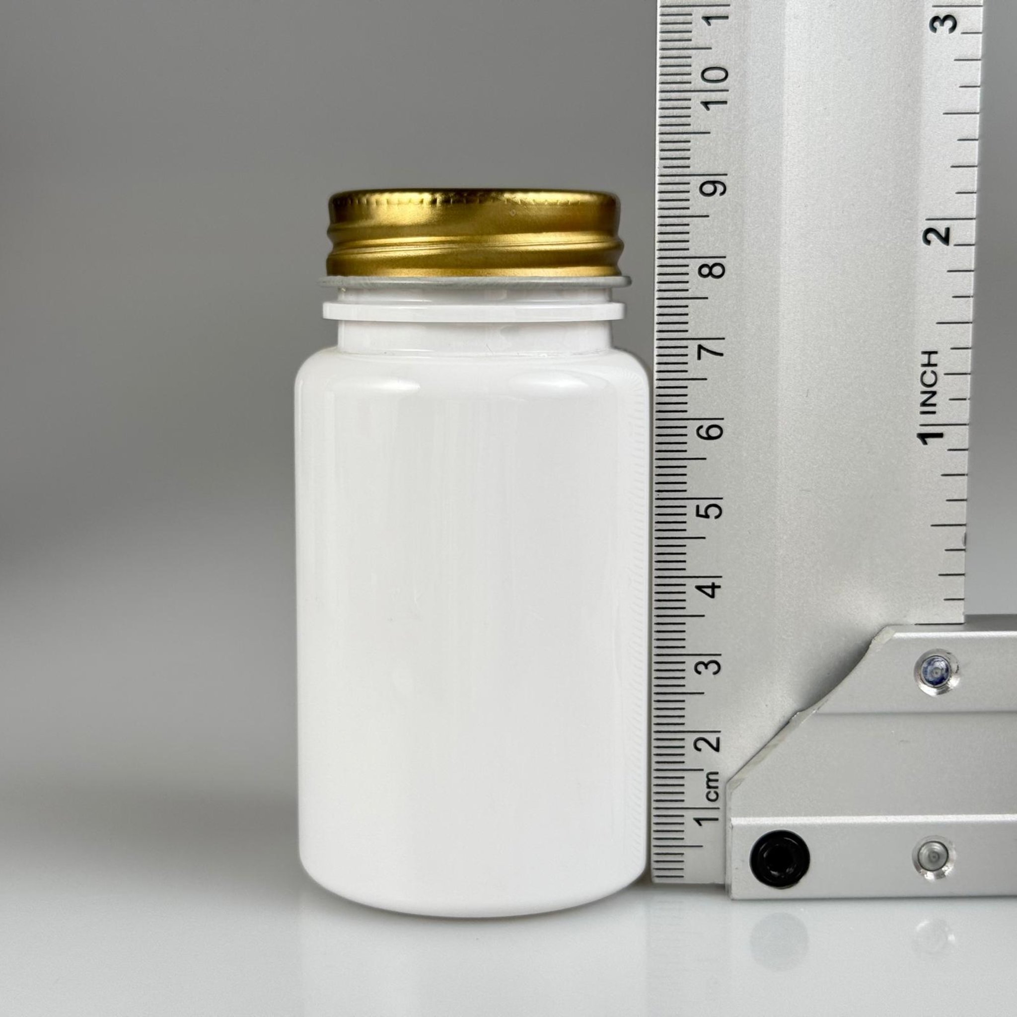 100 CC BEYAZ PET TABLET ŞİŞESİ - GOLD METAL KAPAKLI - 100 ML KAPSÜL KUTUSU - İLAÇ ŞİŞESİ - MEDİKAL HAP ŞİŞESİ - FARMASÖTİK KAVANOZ