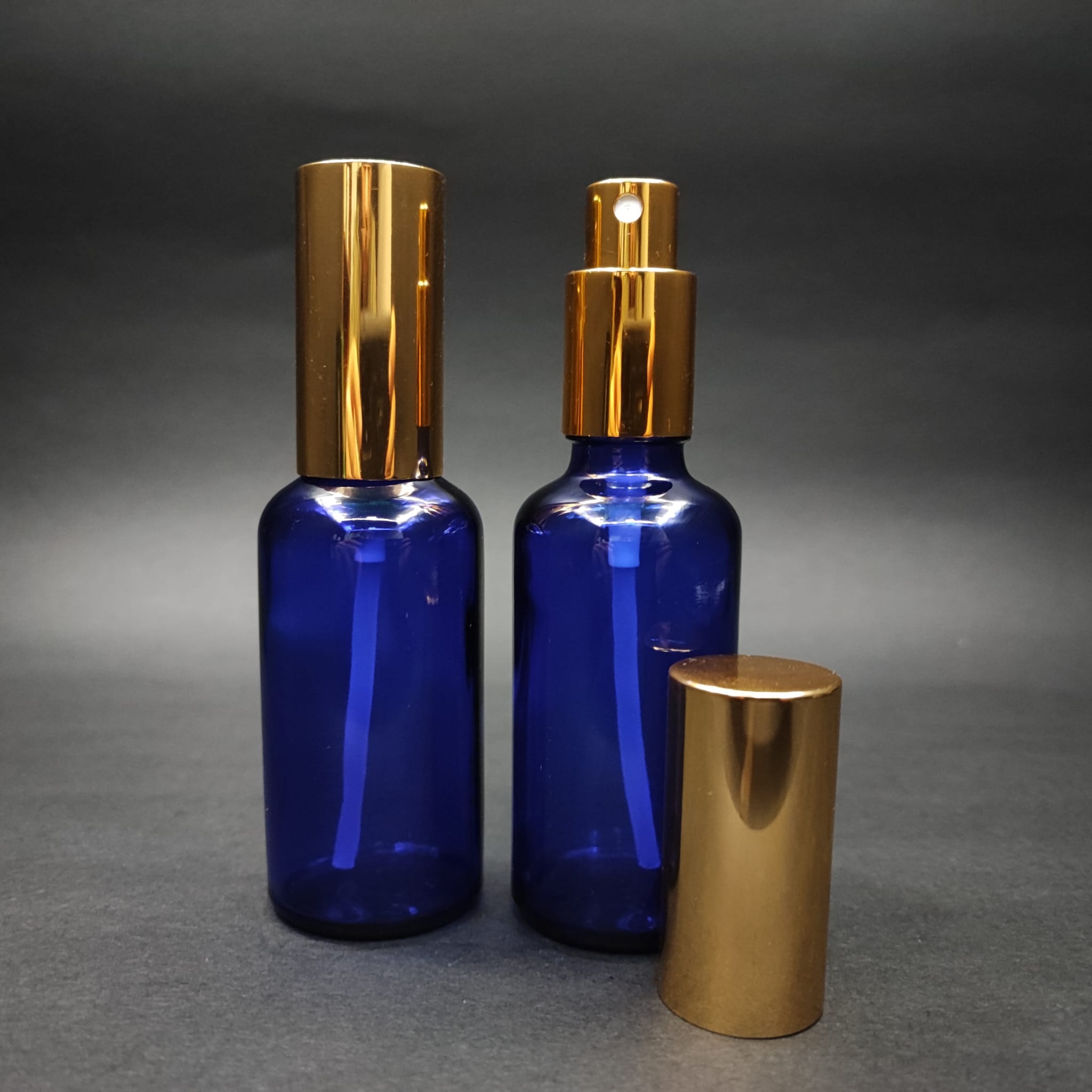 50 ML LÜKS VİDALI VALF ÇEVİRME PARFÜM ŞİŞELERİ - 50 CC MAVİ CAM ŞİŞE - GOLD  METAL SPREYLİ KAPAKLI SET