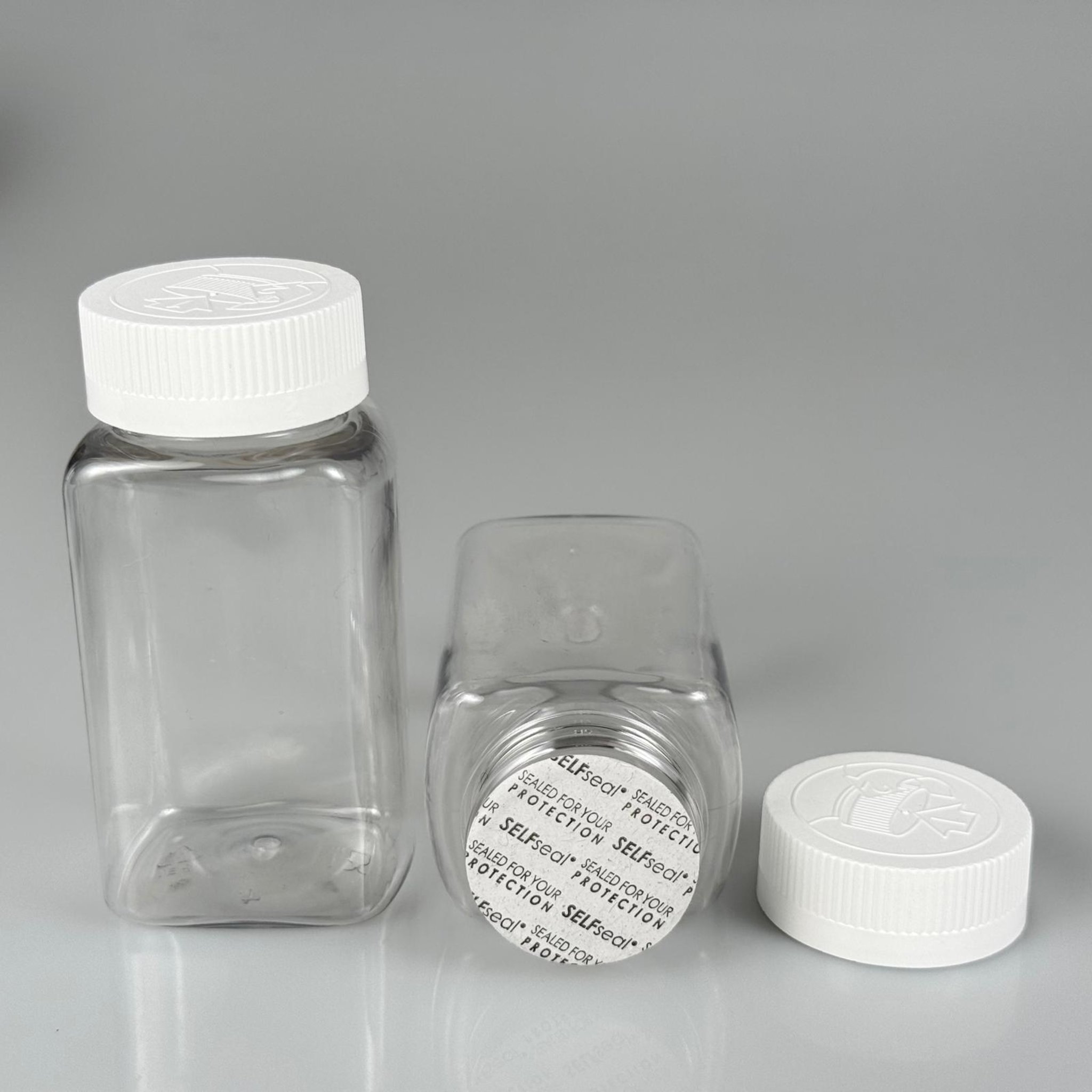 150 ML CONTALI ÇOCUK KİLİT KAPAKLI KARE TABLET ŞİŞESİ  - 150 CC ŞEFFAF PET KAVANOZ + 38 MM BEYAZ ÇOCUK KİLİTLİ KAPAK + KENDİNDEN YAPIŞKANLI KÖPÜK CONTA TAKIM -  KAPSÜL KUTUSU - İLAÇ ŞİŞESİ - MEDİKAL HAP ŞİŞESİ - FARMASÖTİK KAVANOZ