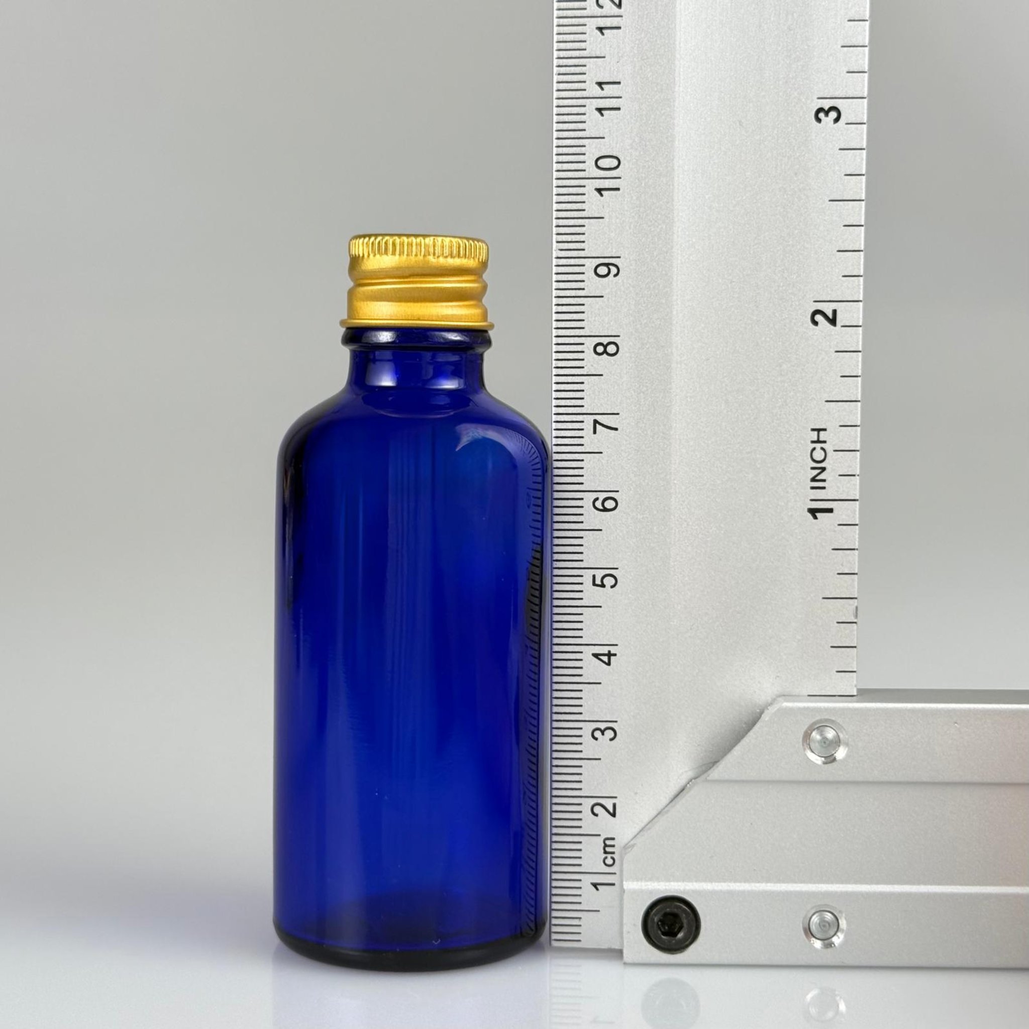 50 CC MAVİ CAM ŞİŞE + KÖPÜK CONTALI GOLD  ALÜMİNYUM METAL KAPAKLI TAKIM - 50 ML MAVİ CAM ŞİŞE