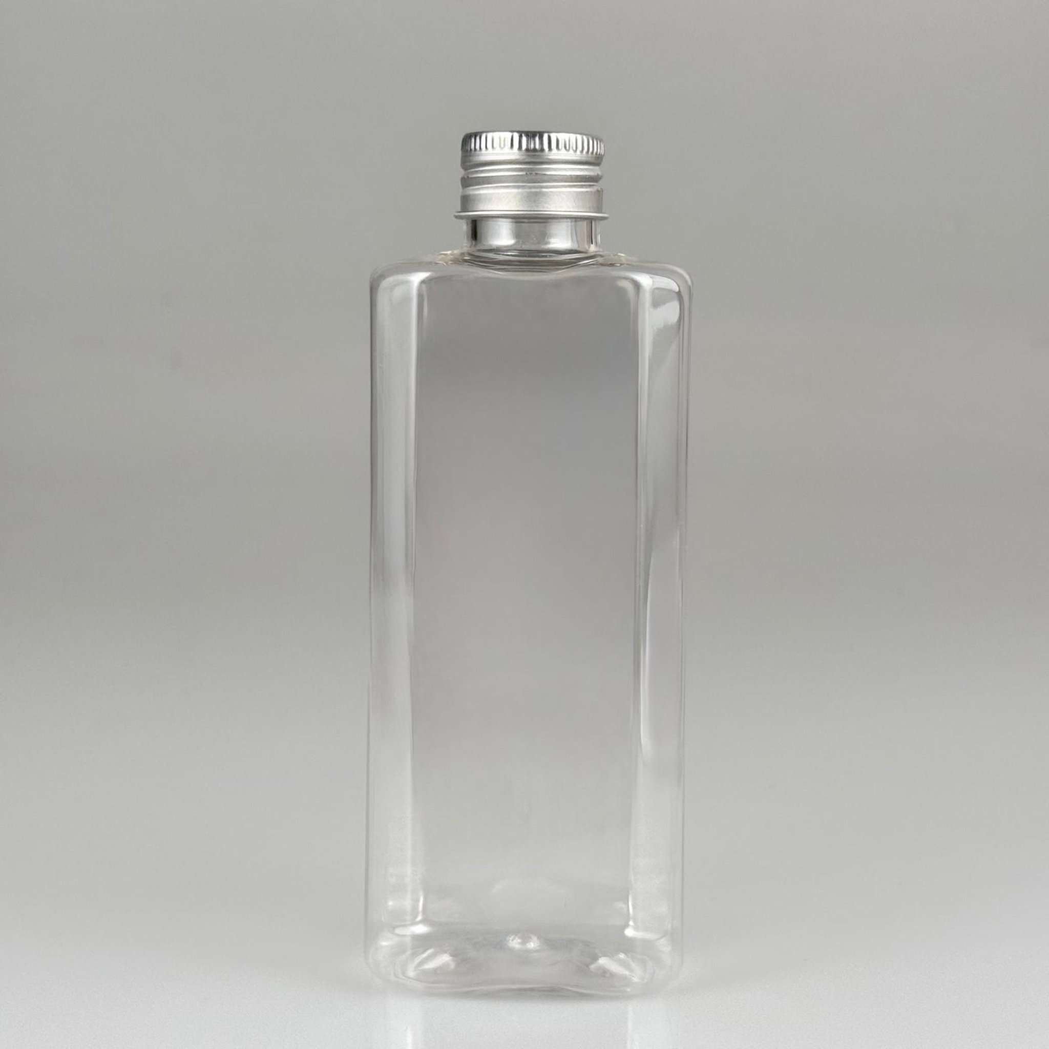 200 CC YASSI MODEL ŞEFFAF PET ŞİŞE (24 AĞIZ) + KÖPÜK CONTALI GÜMÜŞ METAL ALÜMİNYUM KAPAK TAKIM - 200 ML KAPAKLI PLASTİK ŞİŞELER