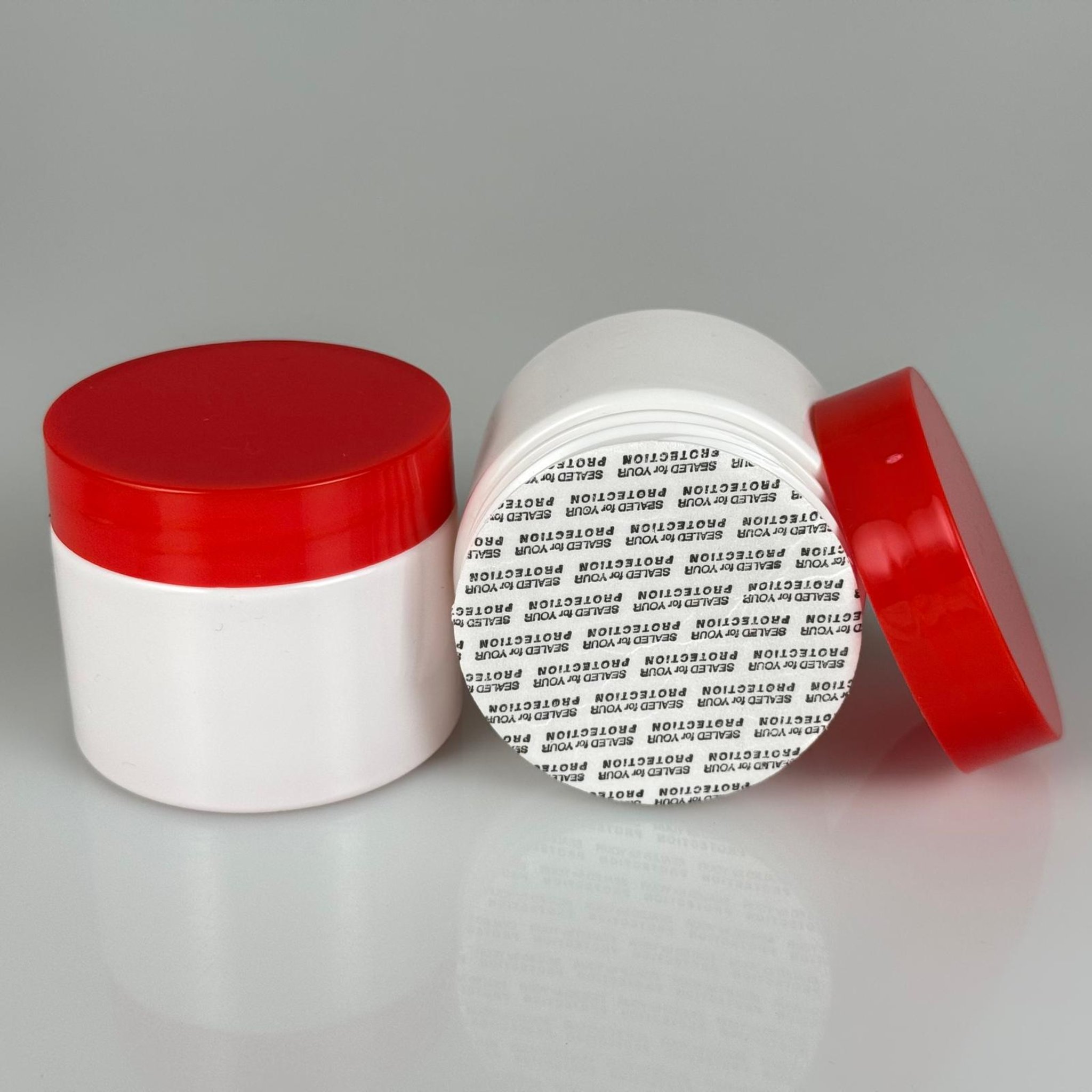 100 CC BEYAZ PET KAVANOZ + KIRMIZI PLASTİK KAPAKLI - KENDİNDEN YAPIŞKANLI KÖPÜK CONTALI TAKIM - 100 ML PLASTİK KREM KAVANOZU