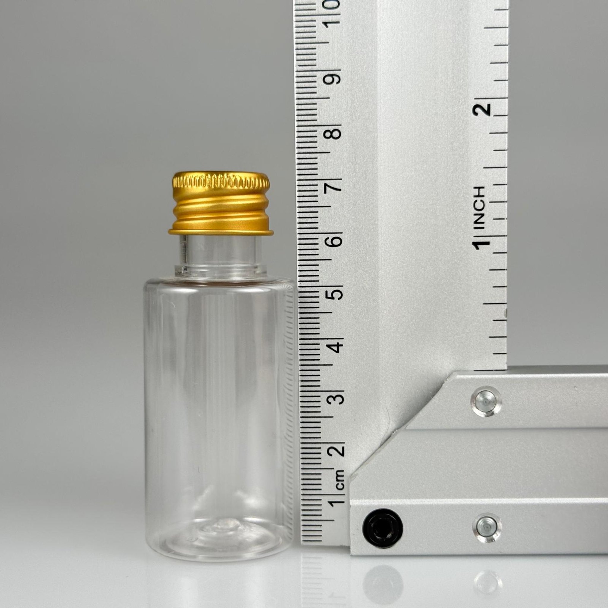 30 CC SİLİNDİR KISA MODEL PET ŞİŞE - KÖPÜK CONTALI GOLD ALÜMİNYUM METAL KAPAKLI + KÖR TIPALII TAKIM - 30 ML ŞEFFAF PET ŞİŞE