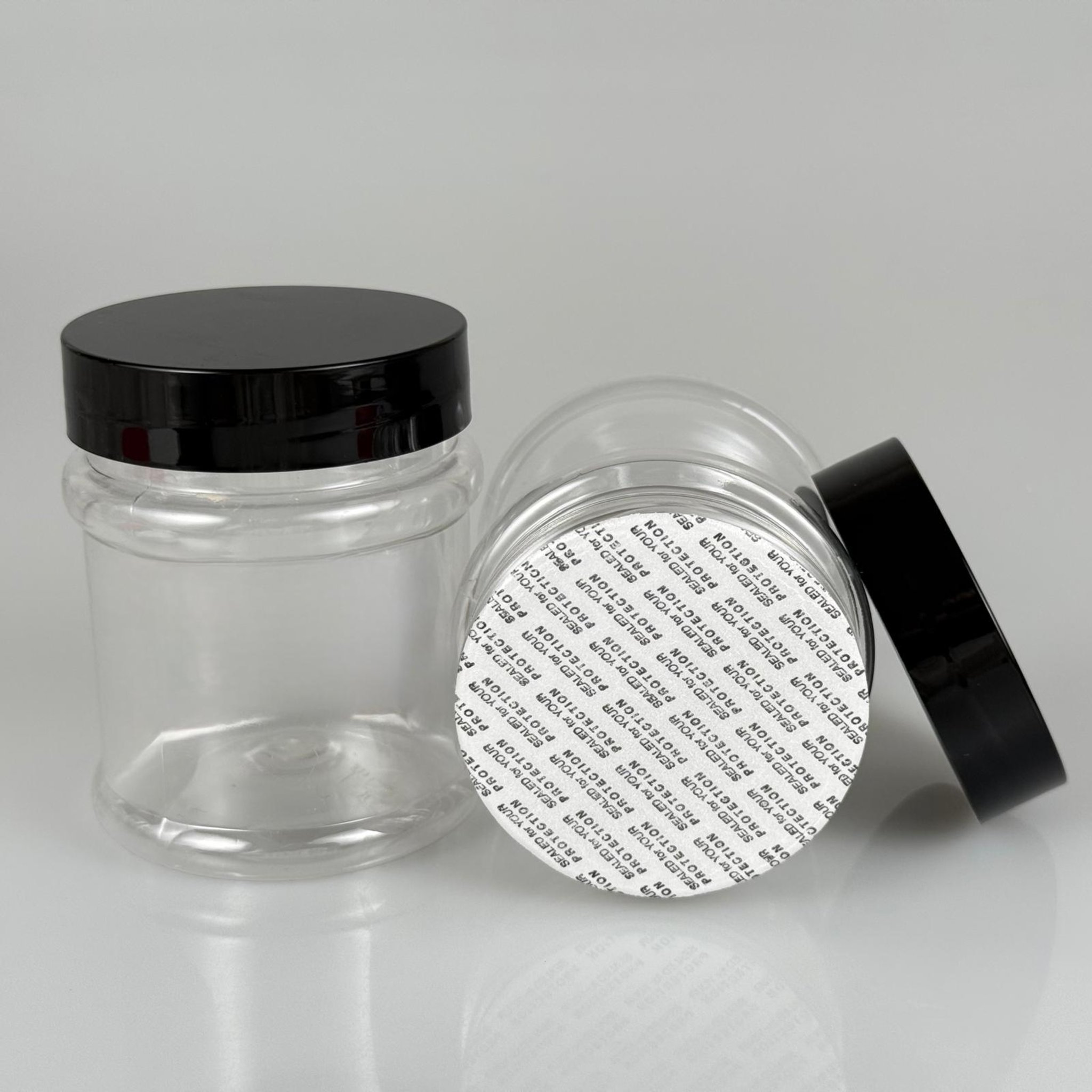 200 CC SİLİNDİR PET KAVANOZ + SİYAH PLASTİK KAPAKLI + KENDİNDEN YAPIŞKANLI KÖPÜK CONTALI TAKIM - 200 ML PLASTİK KAVANOZ