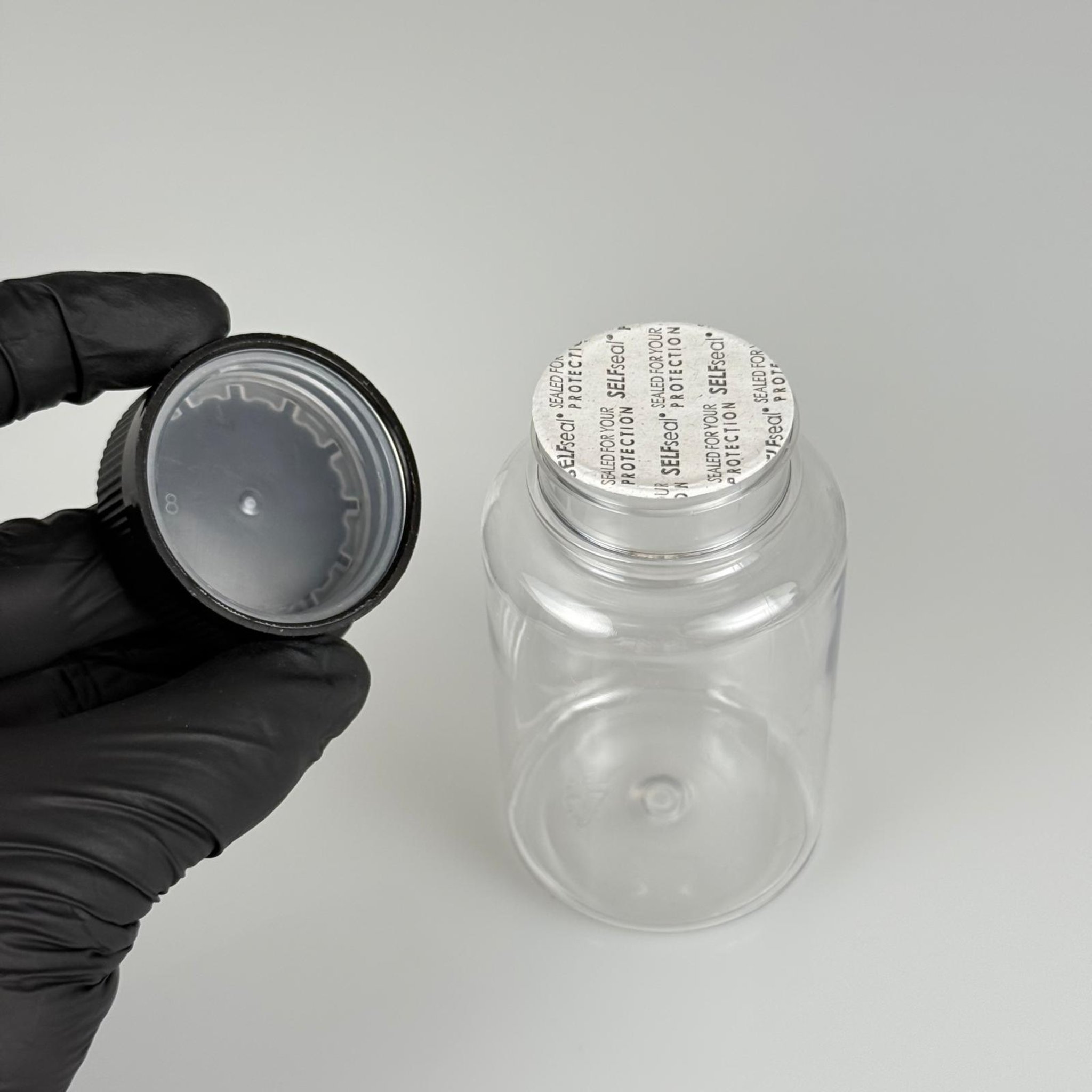 150 ML CONTALI ÇOCUK KİLİT KAPAKLI TABLET ŞİŞESİ  - 150 CC ŞEFFAF PET KAVANOZ + 38 MM SİYAH ÇOCUK KİLİTLİ KAPAK + KENDİNDEN YAPIŞKANLI KÖPÜK CONTA TAKIM -  KAPSÜL KUTUSU - İLAÇ ŞİŞESİ - MEDİKAL HAP ŞİŞESİ - FARMASÖTİK KAVANOZ