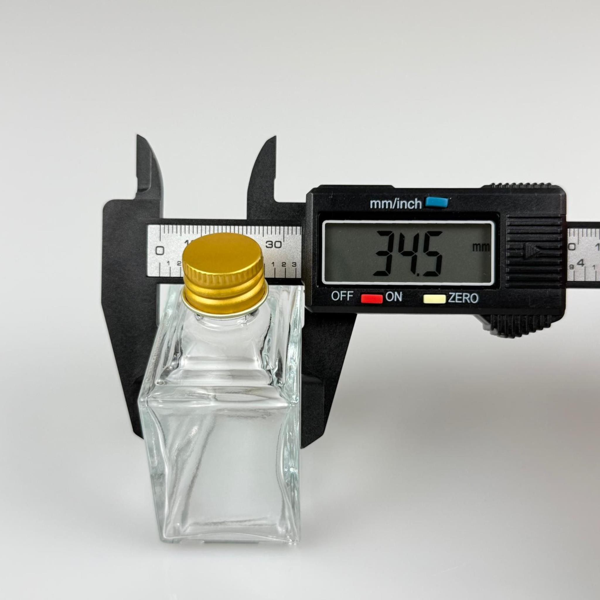 50 CC KÖŞELİ PRİZMA CAM ŞİŞE - GOLD METAL KAPAKLI KOLONYA TIPALI - 50 ML PRESTİJLİ ŞİŞE