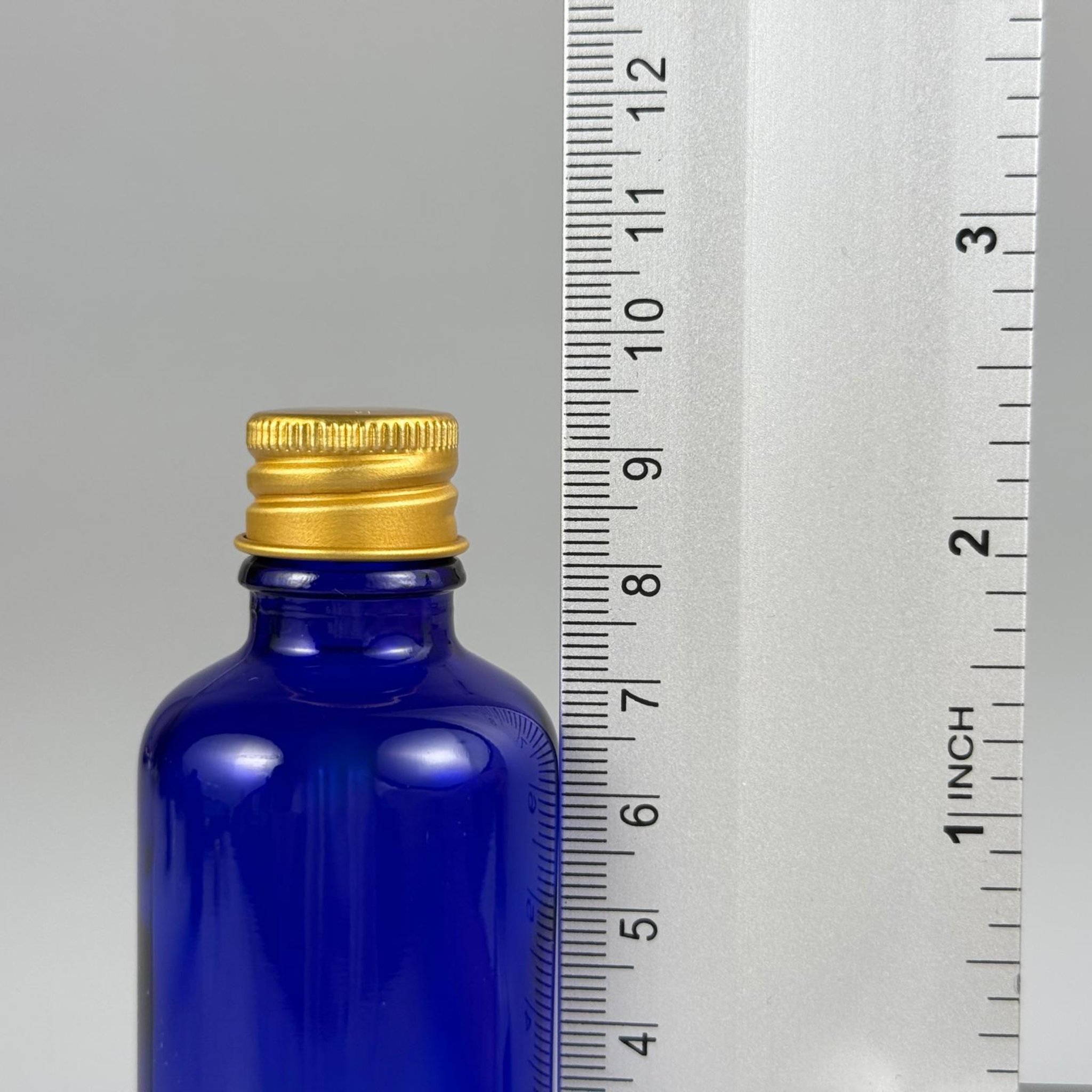 50 CC MAVİ CAM ŞİŞE + KÖPÜK CONTALI GOLD ALÜMİNYUM METAL KAPAKLI + DAMLALIKLI KOLONYA TIPALI TAKIM - 50 ML MAVİ CAM ŞİŞE