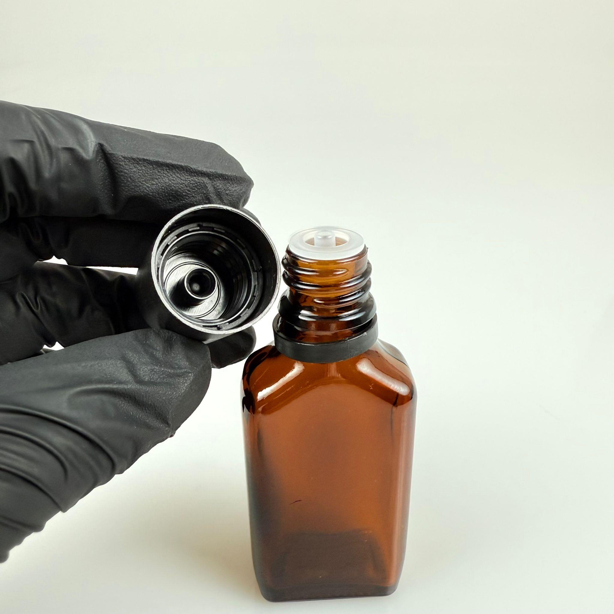 30 CC AMBER YASSI CAM ŞİŞE + İÇTEN DAMLALIKLI ÇOCUK KİLİTLİ SİYAH KAPAK - KAHVERENGİ 30 ML KİLİT KAPAKLI DAMLATMALI ŞİŞE