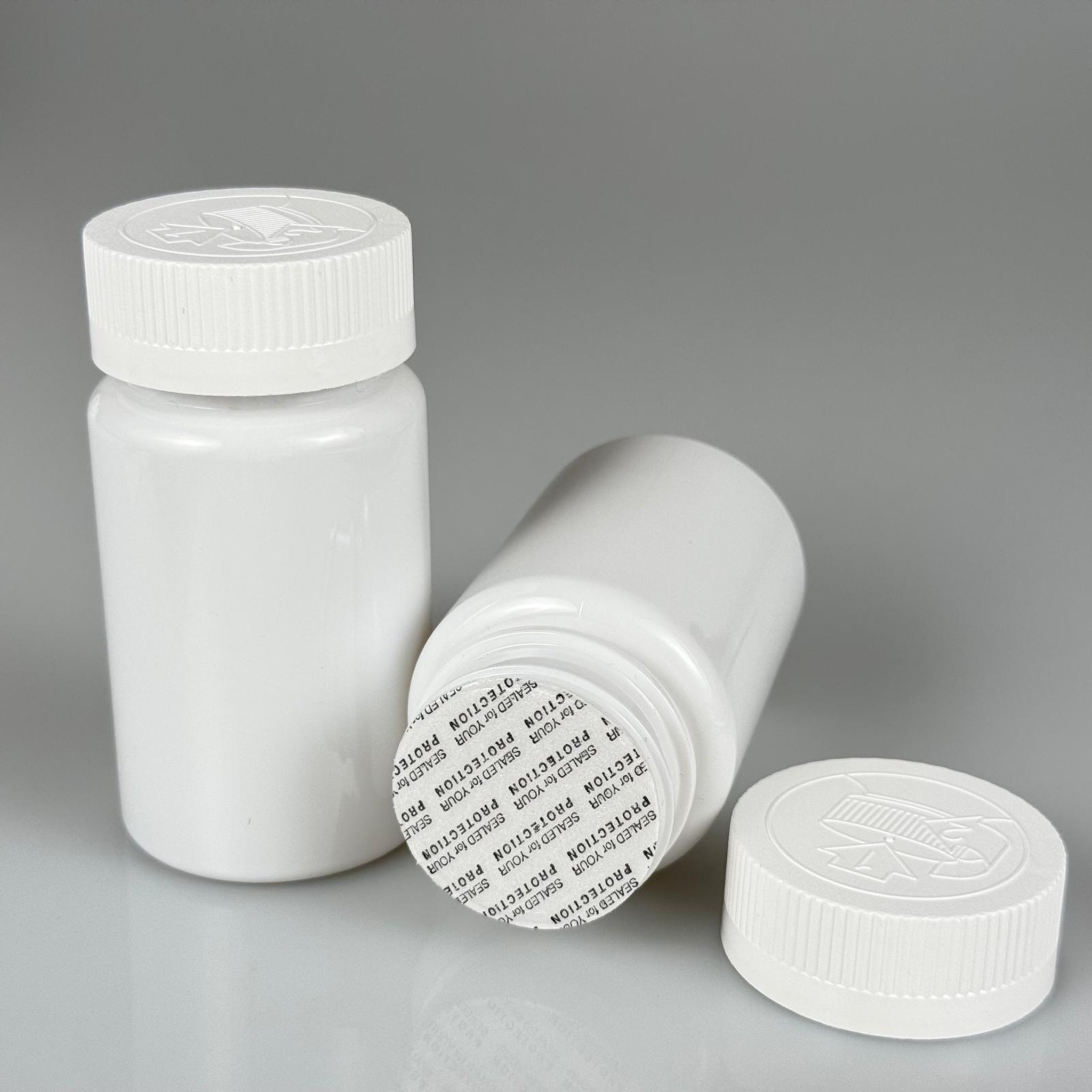 100 ML CONTALI ÇOCUK KİLİT KAPAKLI TABLET ŞİŞESİ  - 100 CC BEYAZ PET KAVANOZ + 38 MM BEYAZ ÇOCUK KİLİTLİ KAPAK + KENDİNDEN YAPIŞKANLI KÖPÜK CONTA TAKIM -  KAPSÜL KUTUSU - İLAÇ ŞİŞESİ - MEDİKAL HAP ŞİŞESİ - FARMASÖTİK KAVANOZ