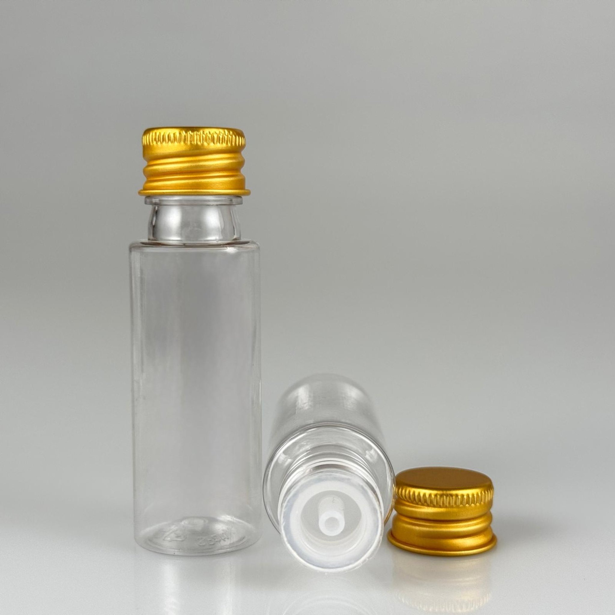 20 CC ŞEFFAF PET ŞİŞE + KÖPÜK CONTALI GOLD MÜŞ ALÜMİNYUM METAL KAPAKLI + DAMLALIKLI KOLOMNYA TIPALI TAKIM - 20 ML PLASTİK ŞİŞE