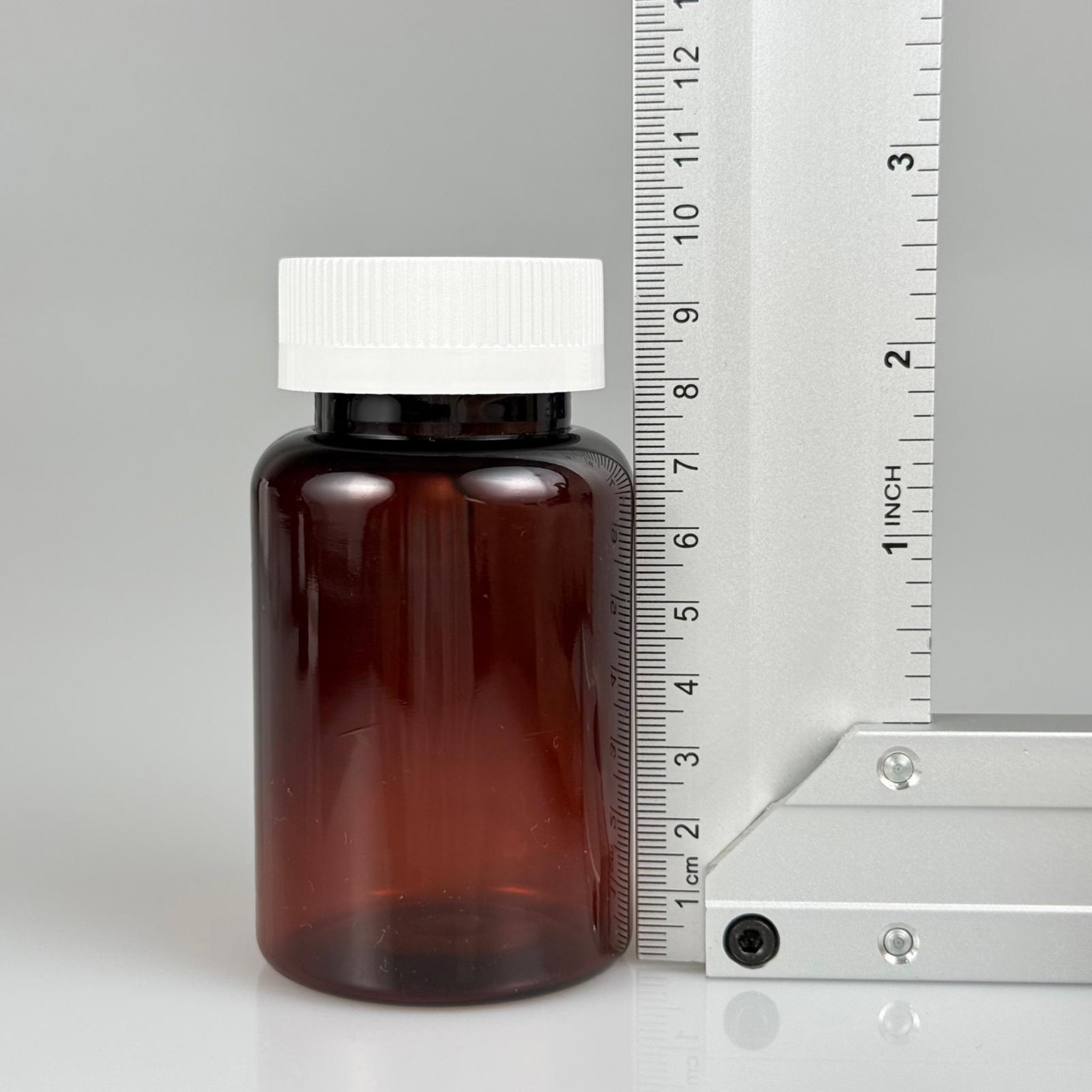 150 ML ÇOCUK KİLİT KAPAKLI TABLET ŞİŞESİ  - 150 CC AMBER PET KAVANOZ + 38 MM BEYAZ ÇOCUK KİLİTLİ KAPAK TAKIM -  KAPSÜL KUTUSU - İLAÇ ŞİŞESİ - MEDİKAL HAP ŞİŞESİ - FARMASÖTİK KAVANOZ